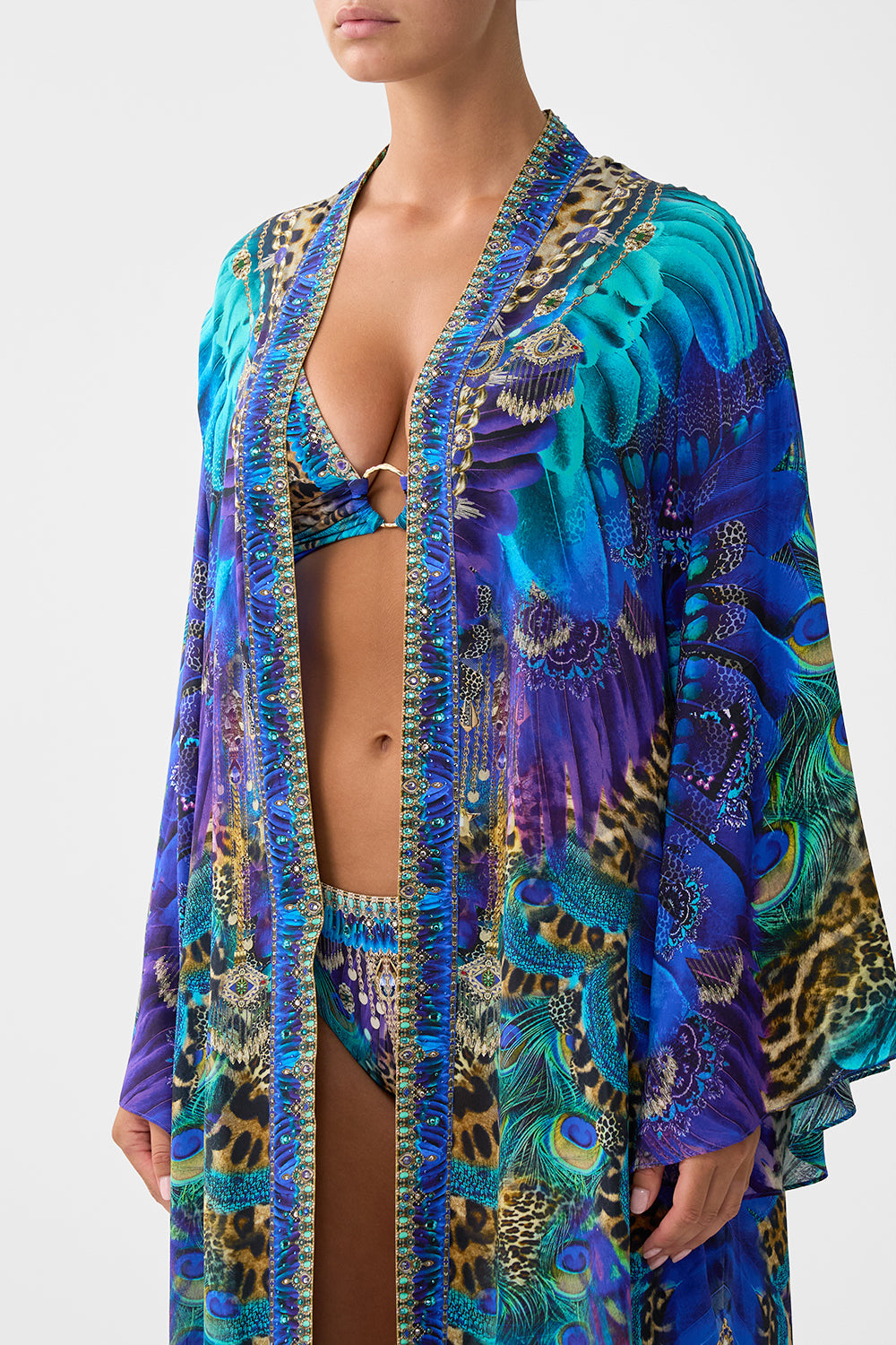 The CAMILLA SHORT KAFTAN WITH CUFF ANIMAL ALCHEMY in our  print.