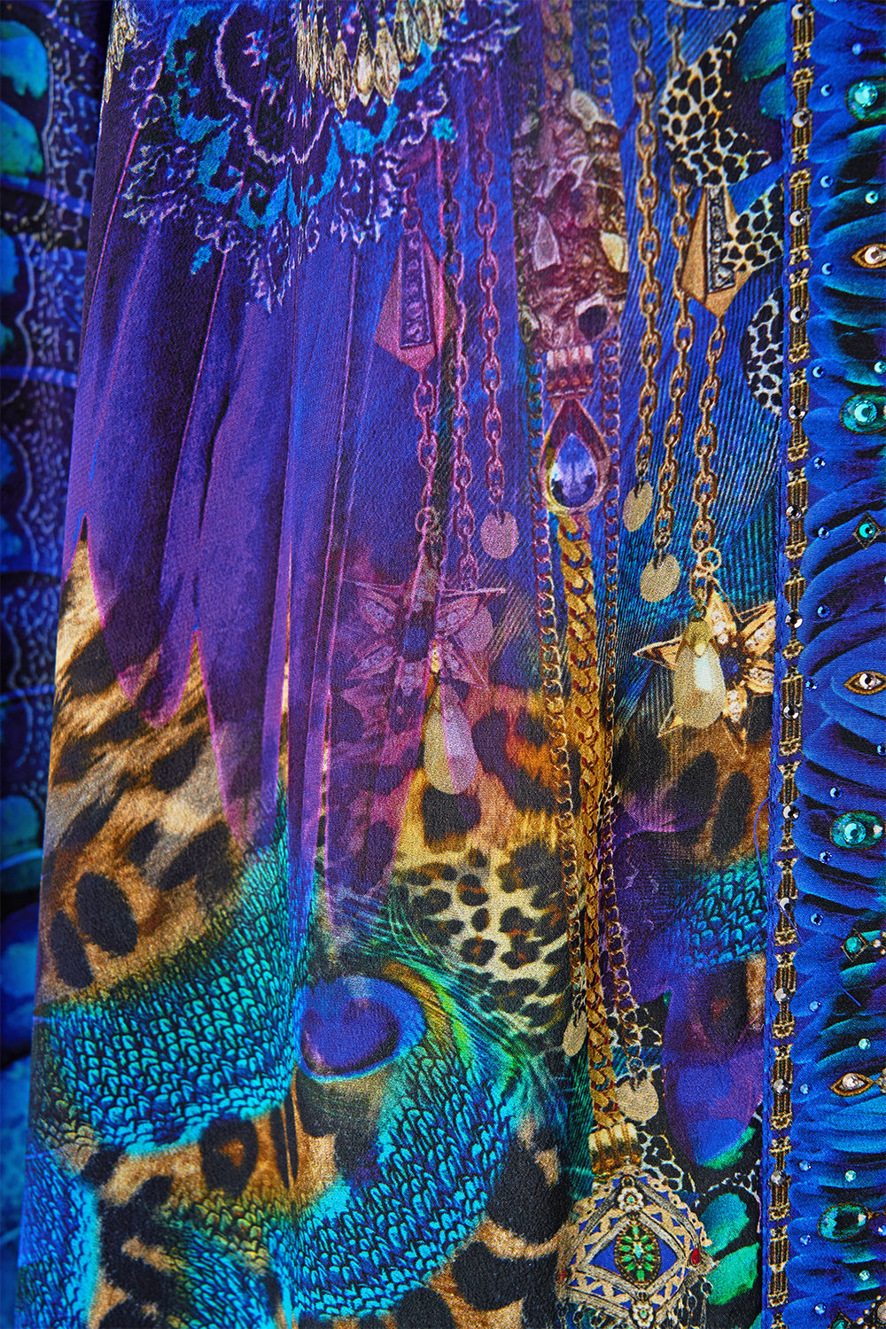 The CAMILLA SHORT KAFTAN WITH CUFF ANIMAL ALCHEMY in our  print.