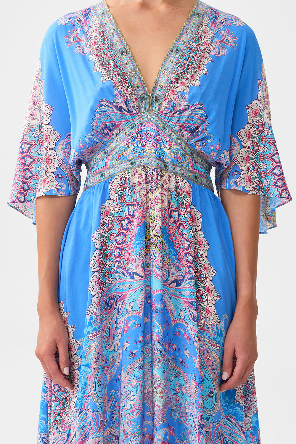 WAISTED DRESS WITH HEM RUFFLE FOOTSTEPS IN FOLKLORE