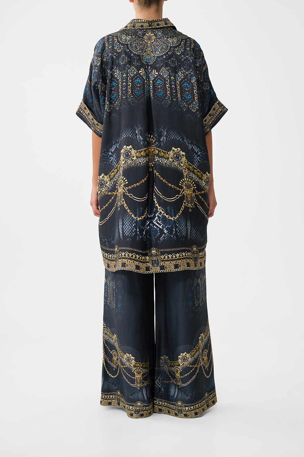 The CAMILLA KIMONO SLEEVE DRESS WITH SHIRRING DETAIL THE CONCUBINES CORRIDOR in our  print.