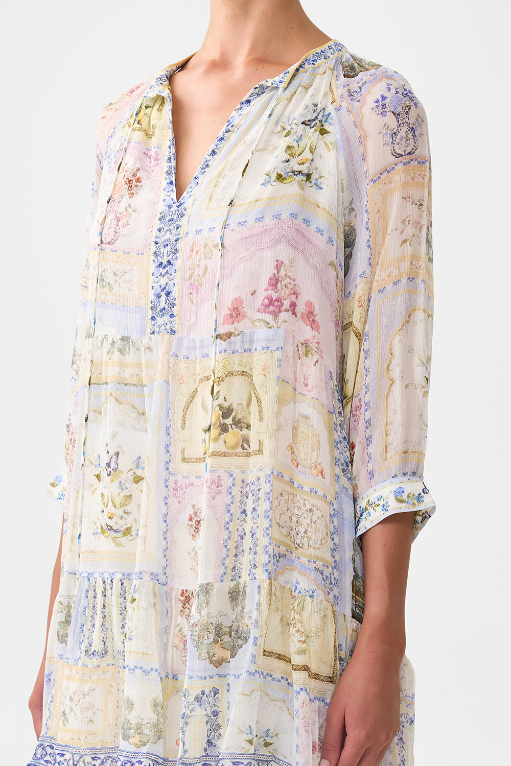 The CAMILLA SMALL CANVAS CLUTCH OTTOMAN DYNASTY in our  print.