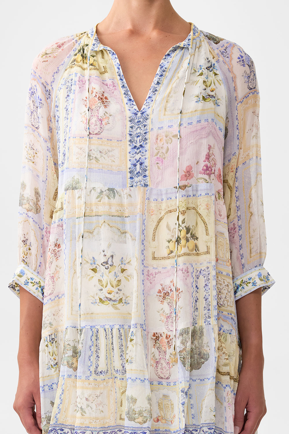 The CAMILLA SMALL CANVAS CLUTCH OTTOMAN DYNASTY in our  print.