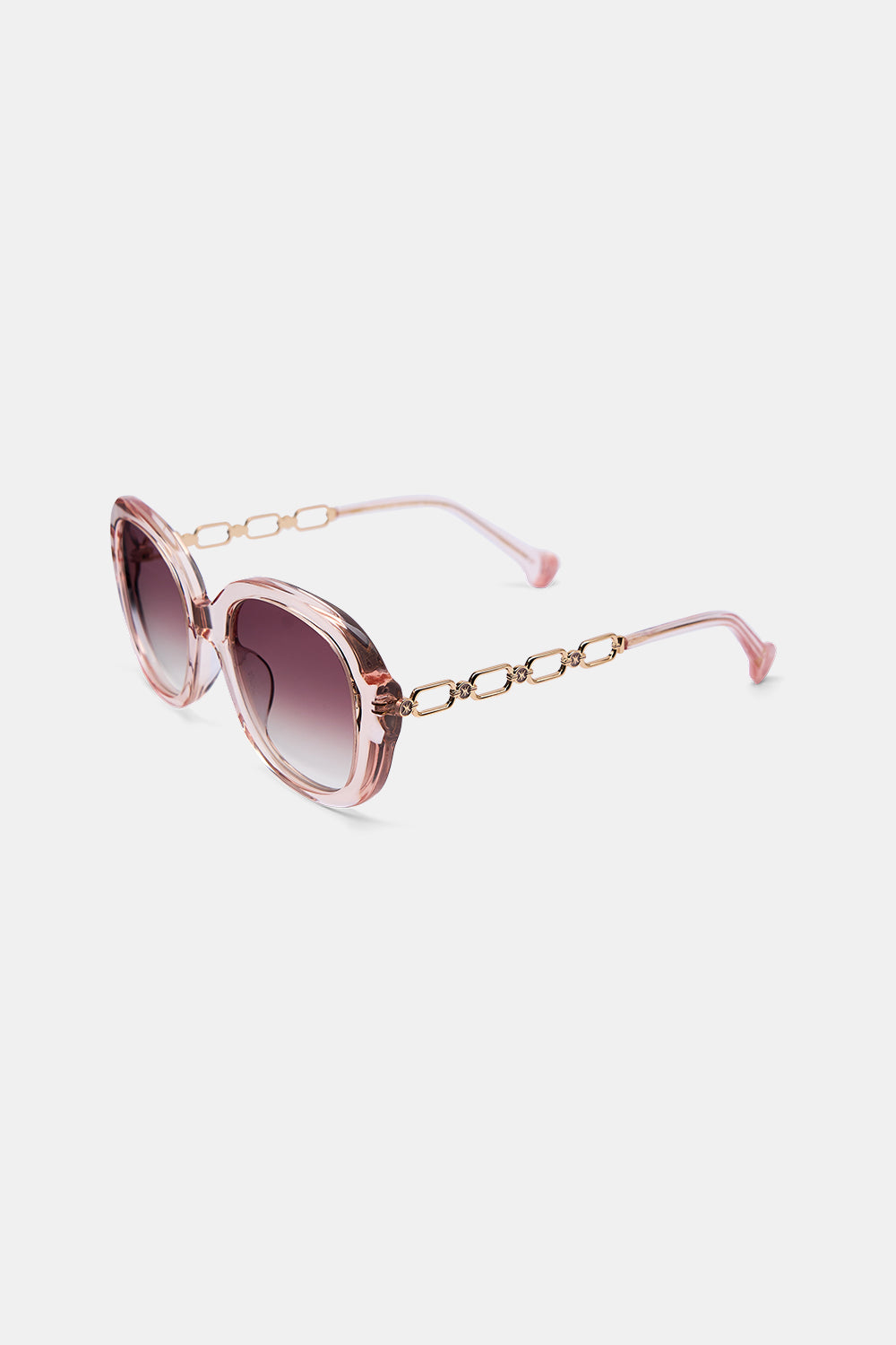 The CAMILLA REVERSIBLE MONOGRAM BUCKLE BELT SOLID PINK in our  print.