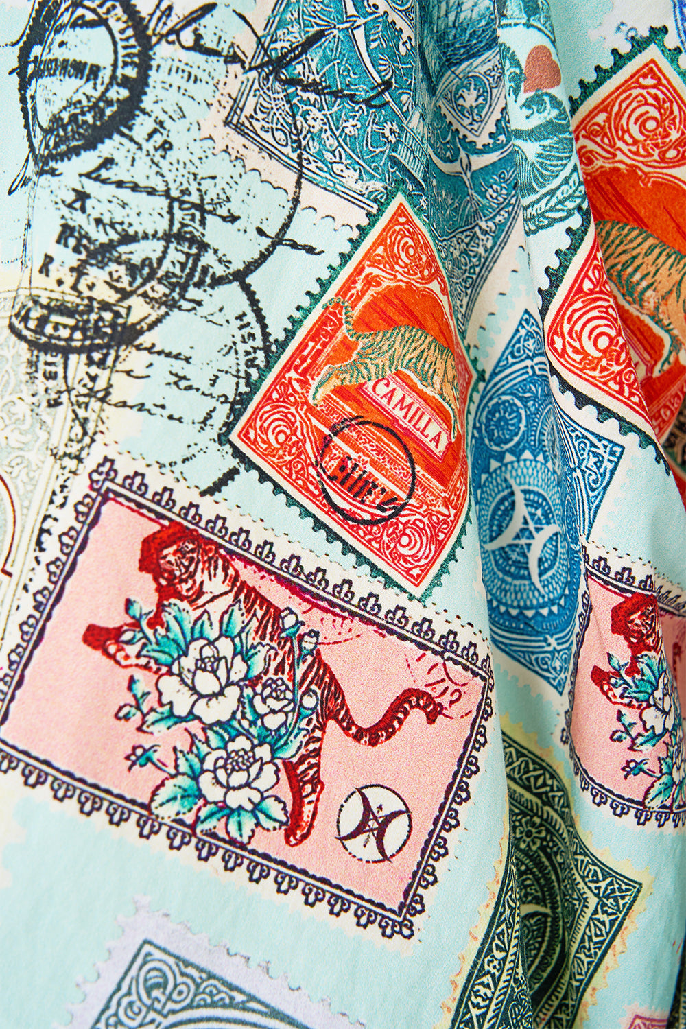 The CAMILLA SHORT KIMONO WRAP OTTOMAN OPULENCE in our  print.