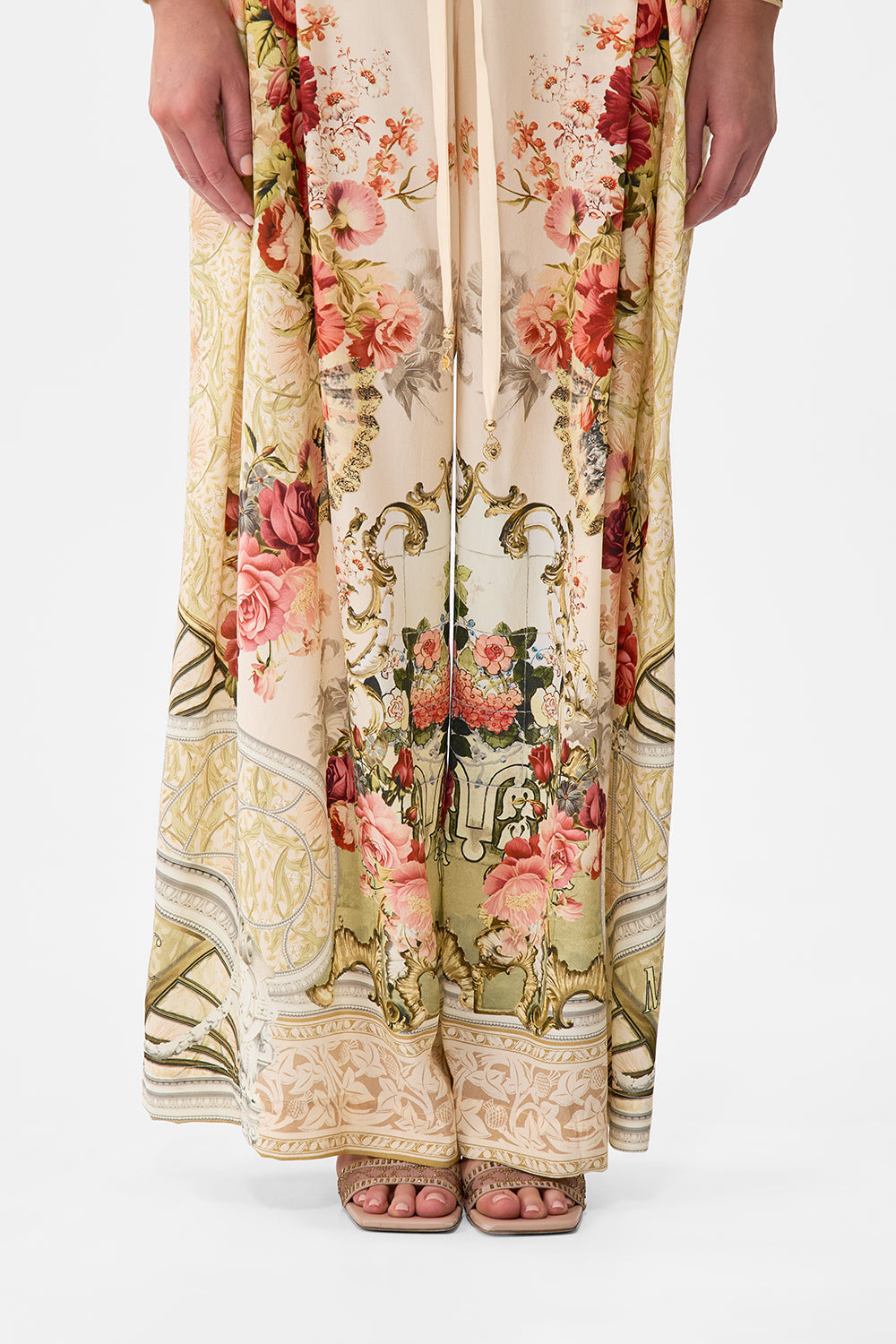 The CAMILLA HALTERNECK JUMPSUIT WITH TIE NECK ISNIK LULLABY in our  print.