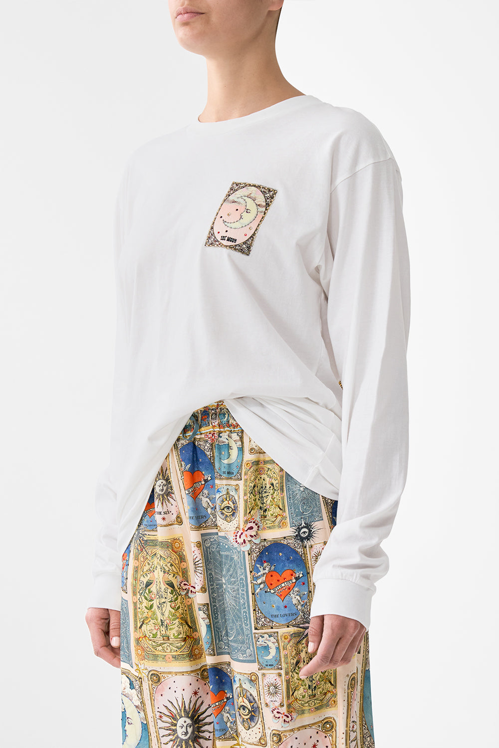 The CAMILLA KIDS STRAIGHT NECK ONE PIECE W FRILL STRAPS ILLUSTRATION NATION in our ILLUSTRATION NATION print.