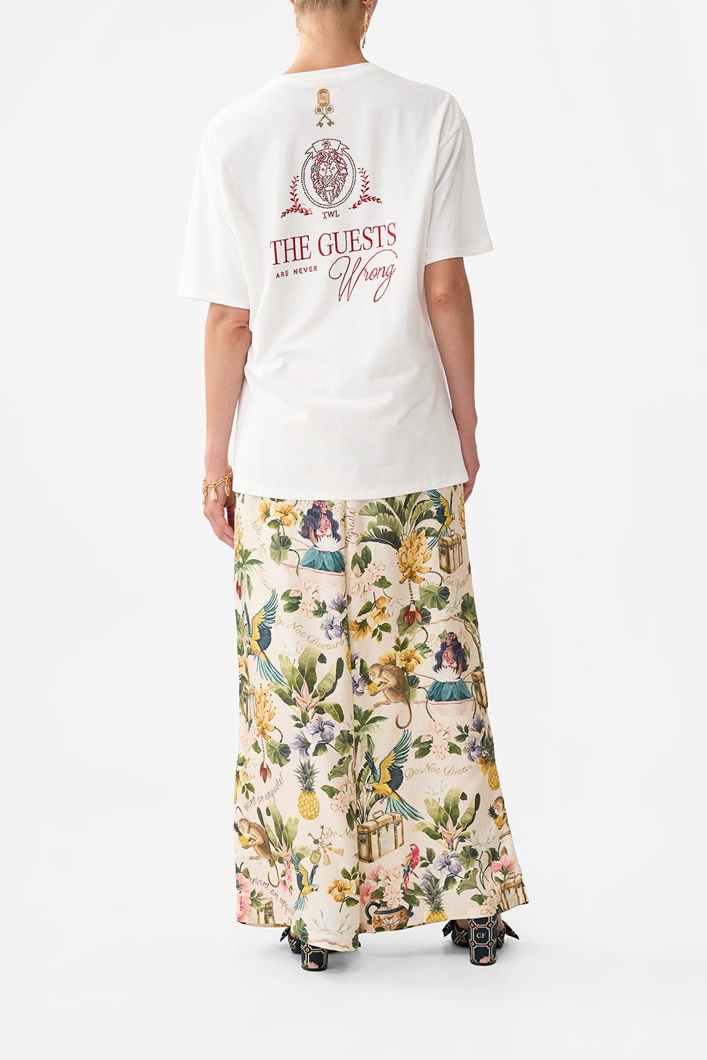 The CAMILLA WIDE LEG TROUSER WITH FRONT POCKETS FAITH, LUCK & JUSTICE in our  print.