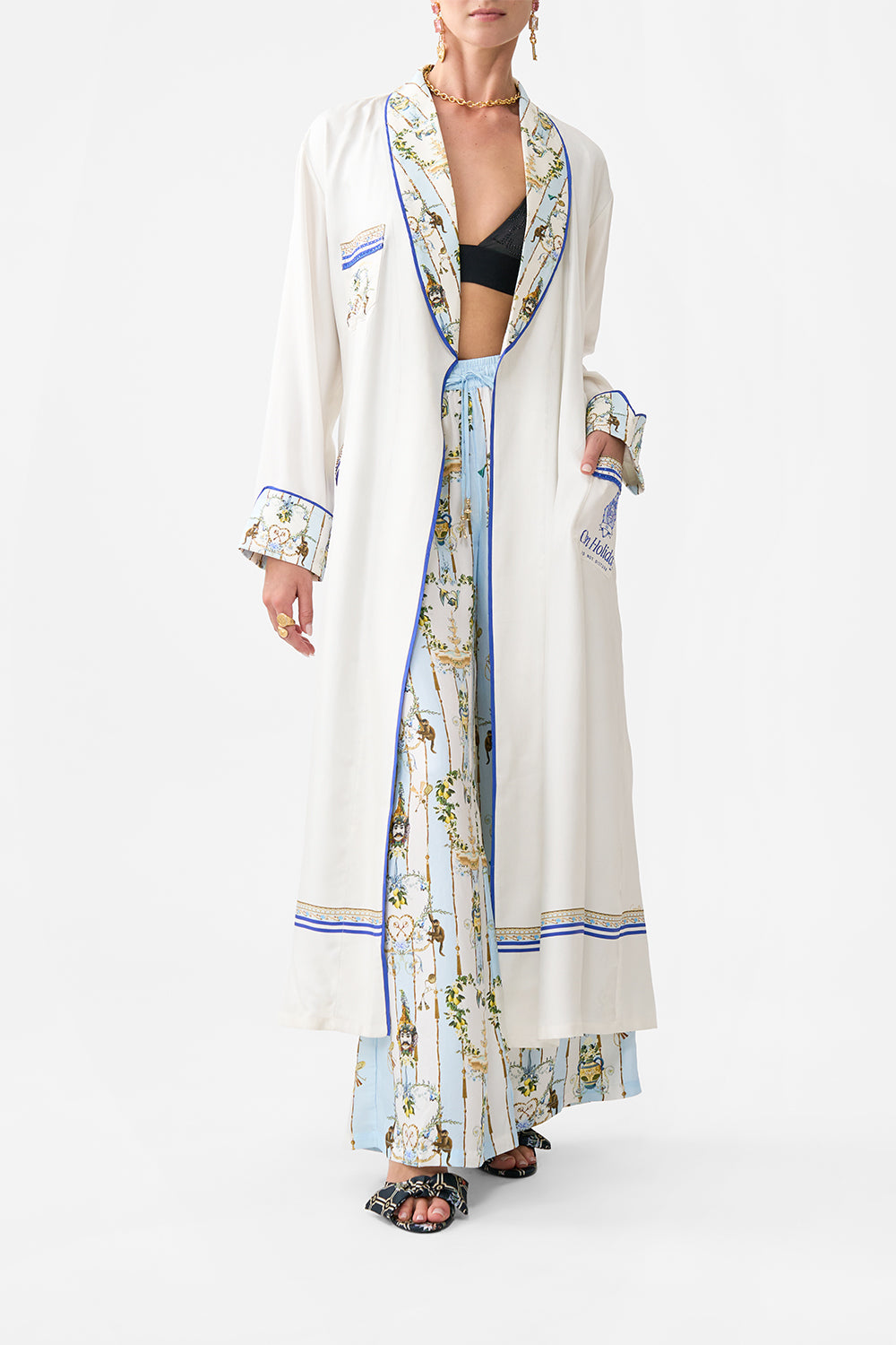 The CAMILLA TIERED DRESS WITH RUFFLE FRILL SLEEVES DRESSING ROOM DRAMA in our  print.
