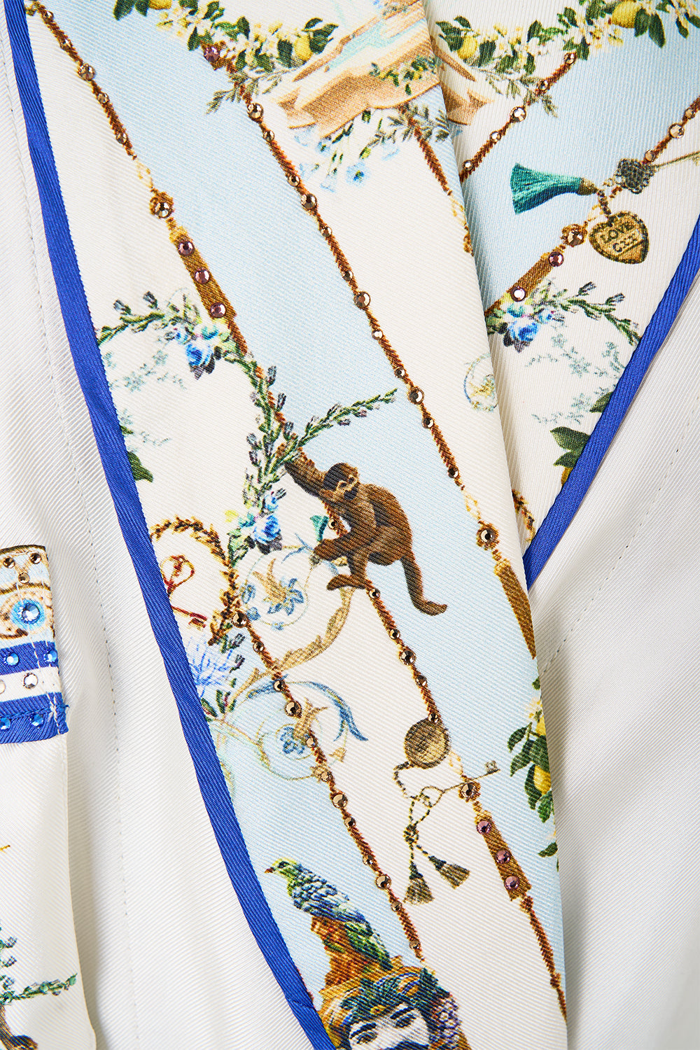 The CAMILLA TIE SLEEVE SHORT V NECK KAFTAN JUST COASTING in our  print.