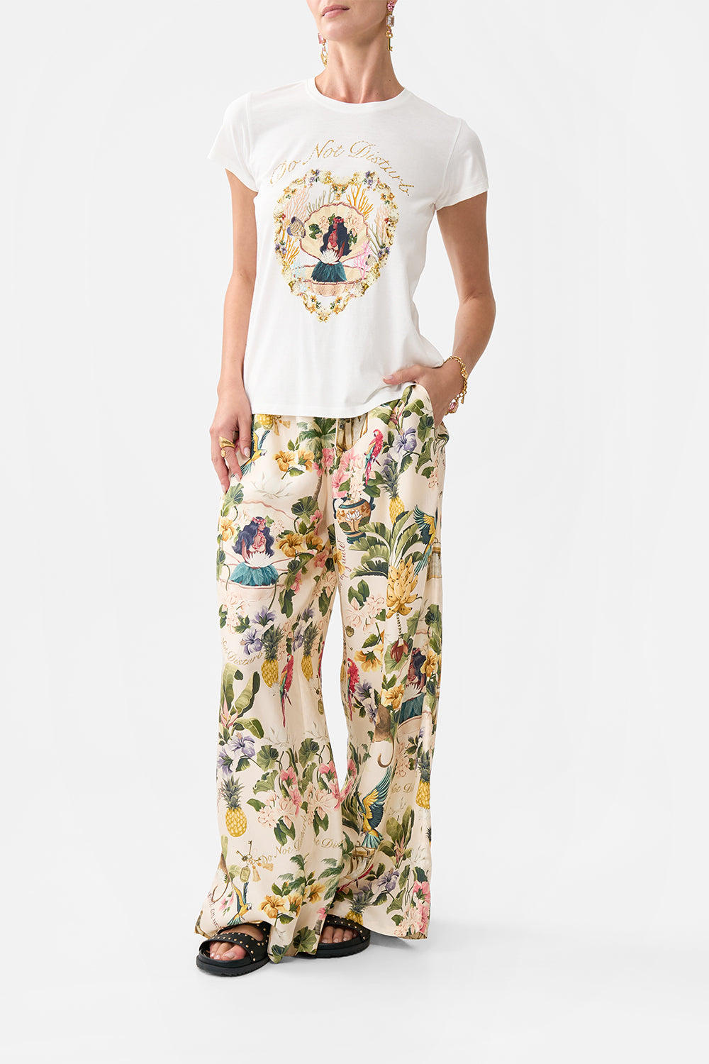 The CAMILLA BUTTON FRONT HALTER PLAYSUIT JUST COASTING in our  print.