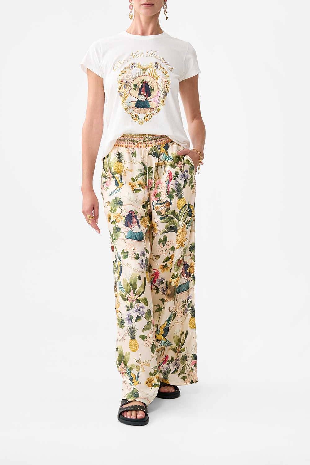The CAMILLA BUTTON FRONT HALTER PLAYSUIT JUST COASTING in our  print.