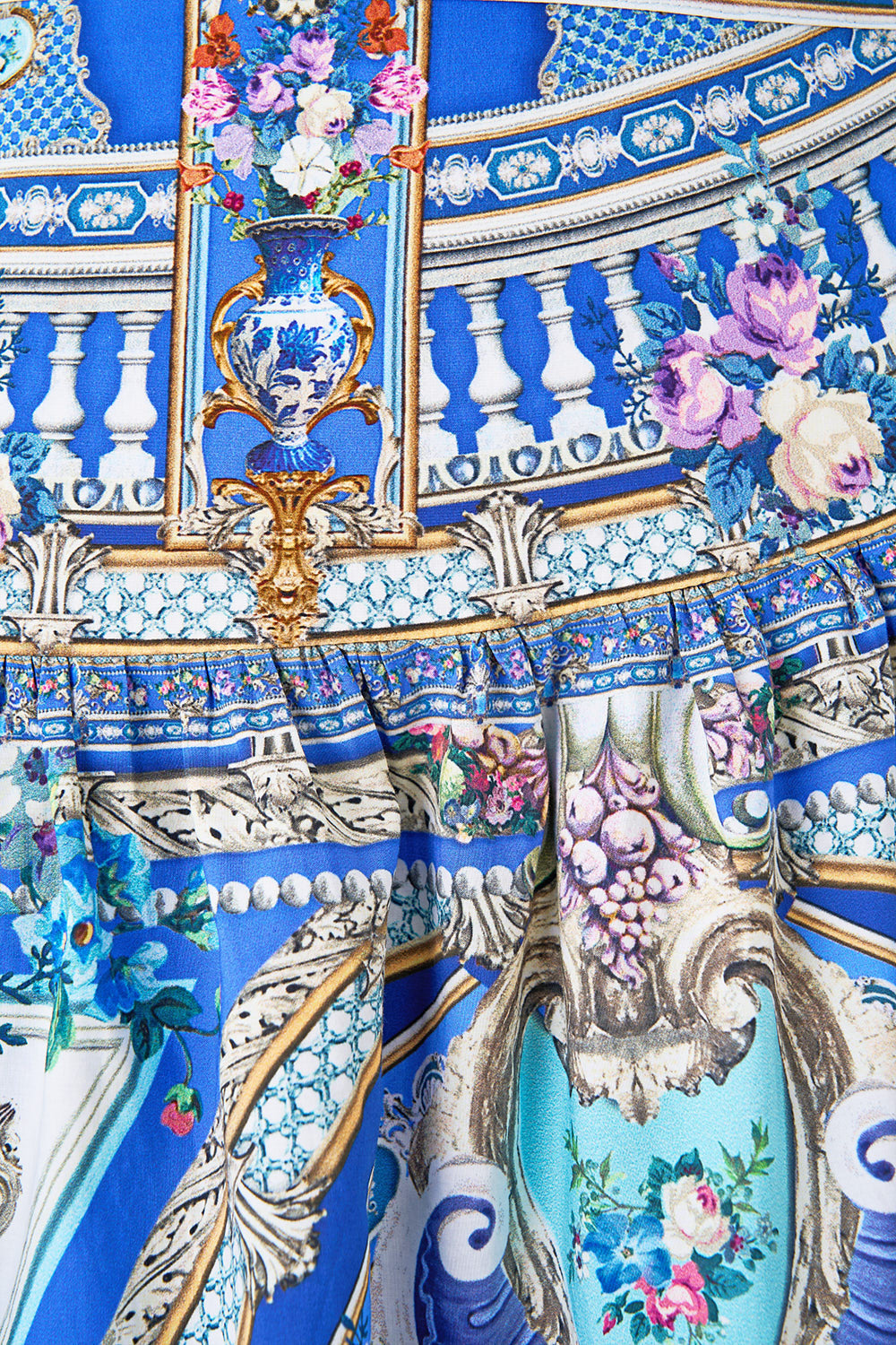 The CAMILLA WAISTED DRESS WITH HEM RUFFLE THE BOSPHOROUS in our  print.