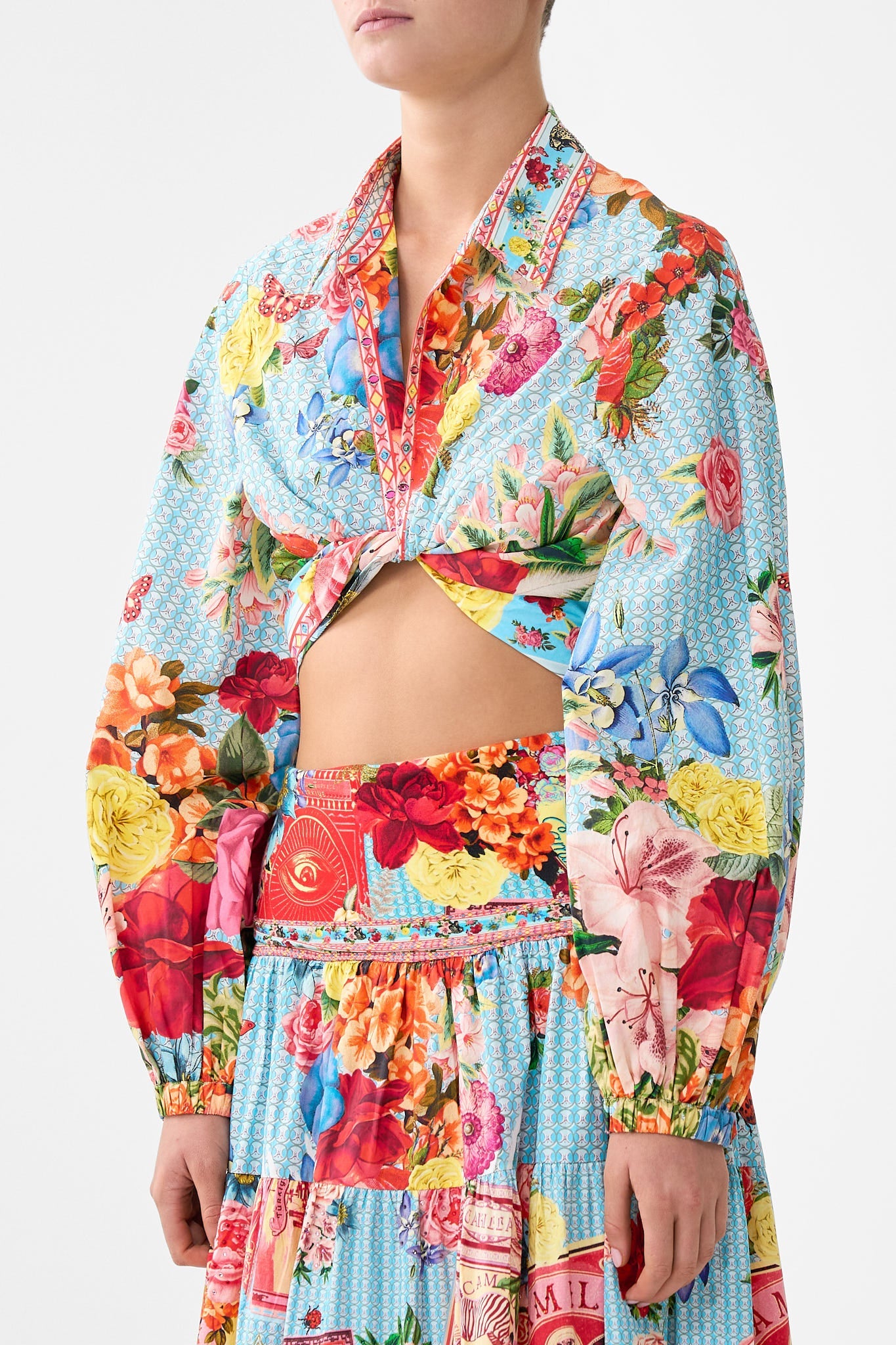 The CAMILLA JERSEY FLARED PANT AMULETS AND ALCHEMY in our  print.
