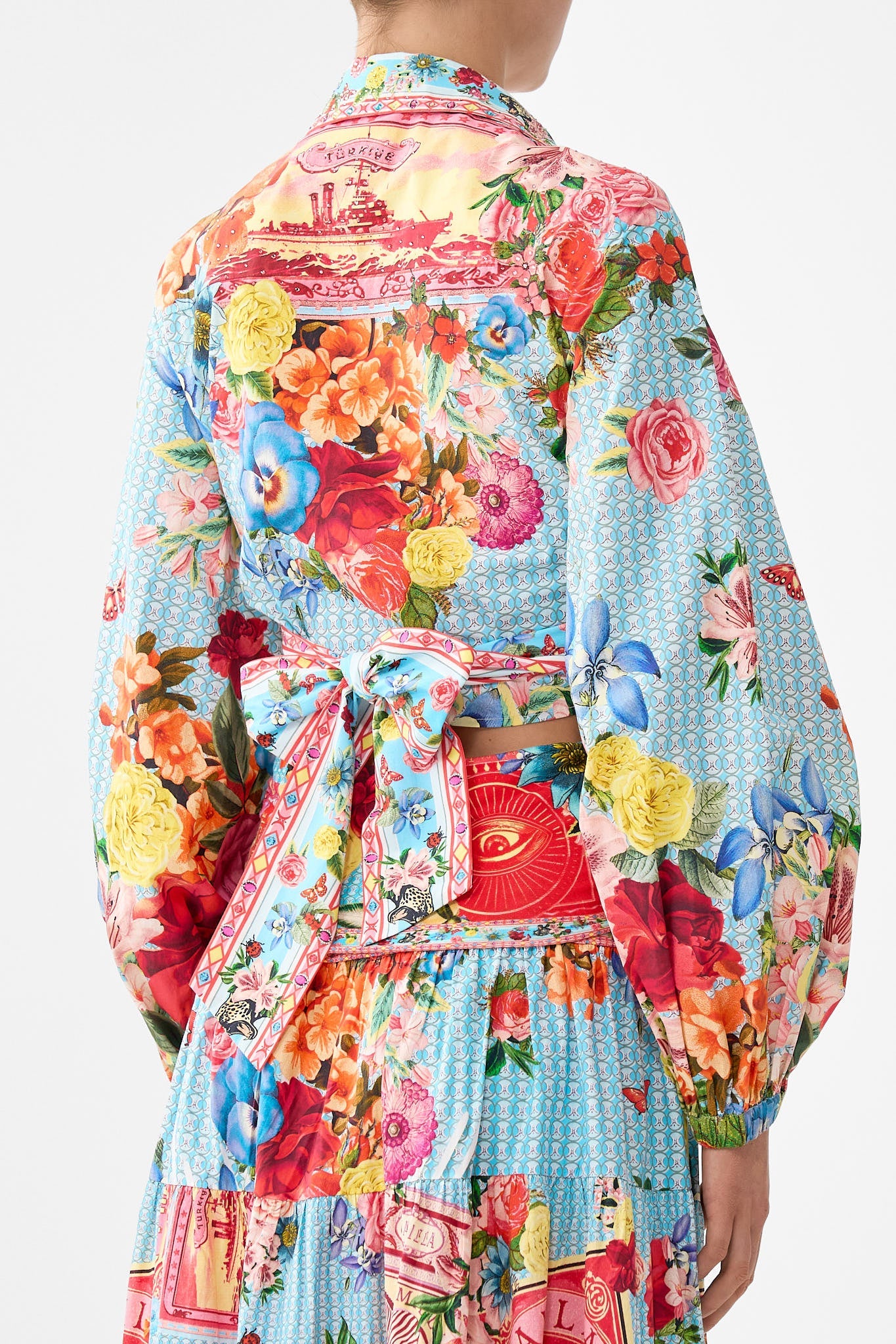 The CAMILLA JERSEY FLARED PANT AMULETS AND ALCHEMY in our  print.