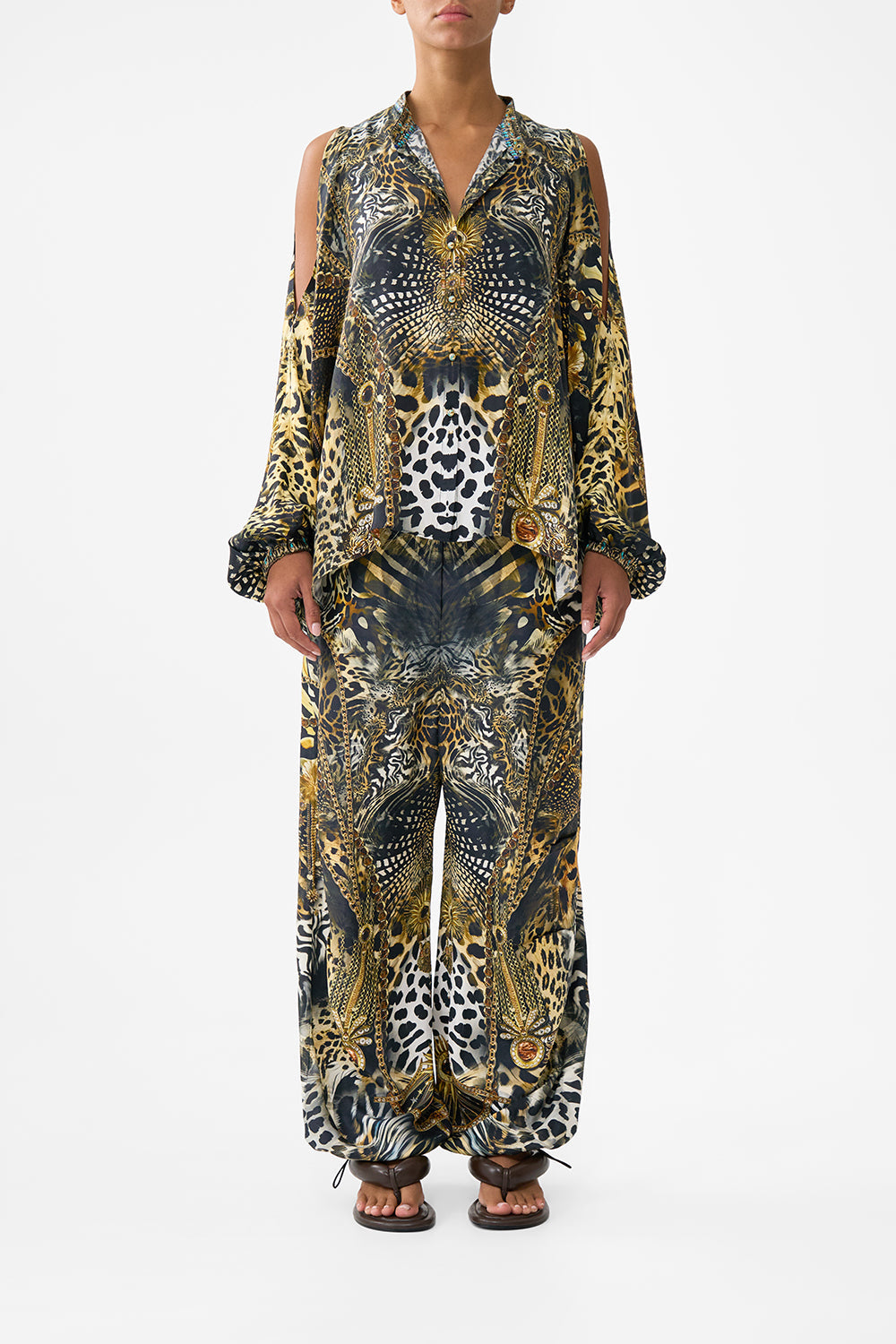 The CAMILLA MID LENGTH BOARDSHORT WITH ELASTIC WAIST SULTANS AND QUEENS in our SULTANS AND QUEENS print.