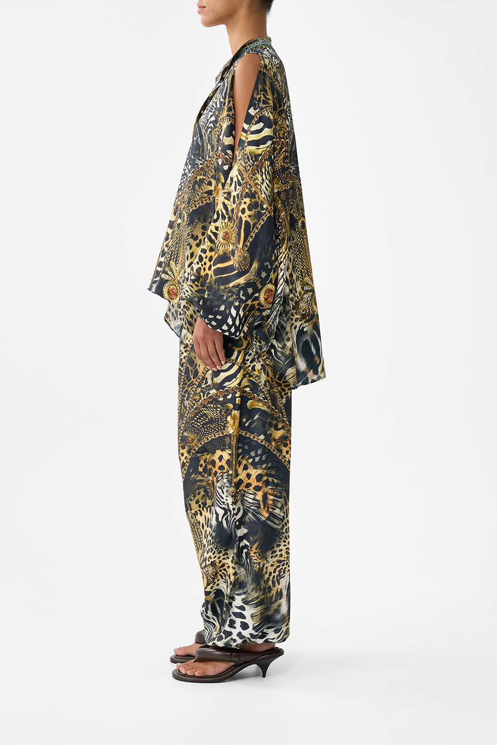 The CAMILLA MID LENGTH BOARDSHORT WITH ELASTIC WAIST SULTANS AND QUEENS in our  print.