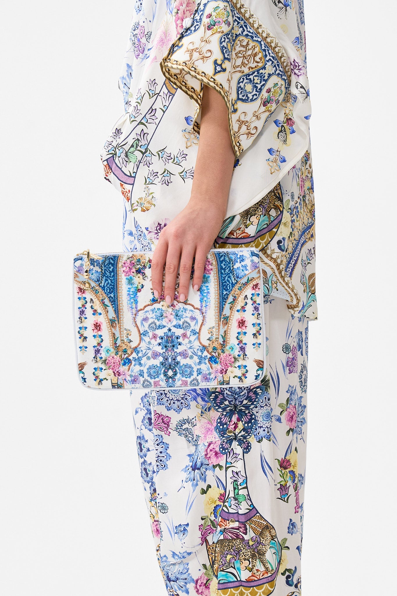 The CAMILLA T-BACK SHOESTRING TOP PAPERS AND CURIOUS CAPERS in our  print.