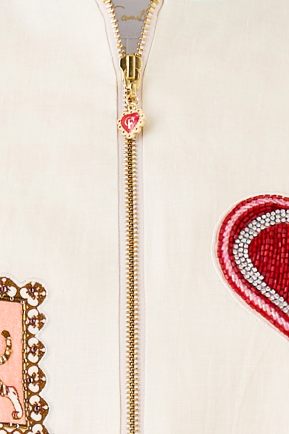 The CAMILLA SMALL CANVAS CLUTCH TOTEMS AND TREASURES in our  print.