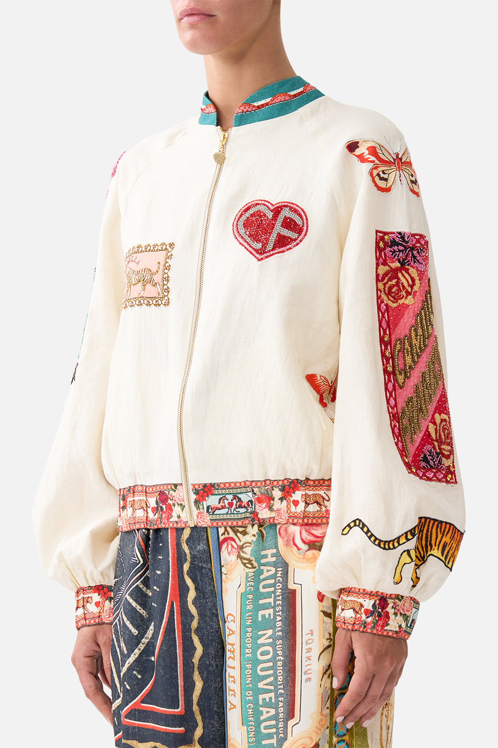The CAMILLA SMALL CANVAS CLUTCH TOTEMS AND TREASURES in our  print.