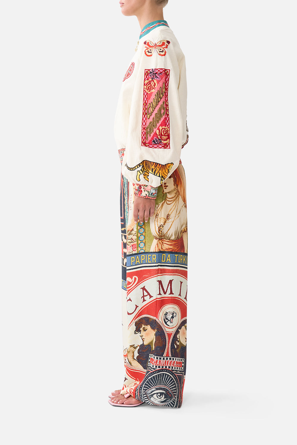 The CAMILLA SMALL CANVAS CLUTCH TOTEMS AND TREASURES in our  print.