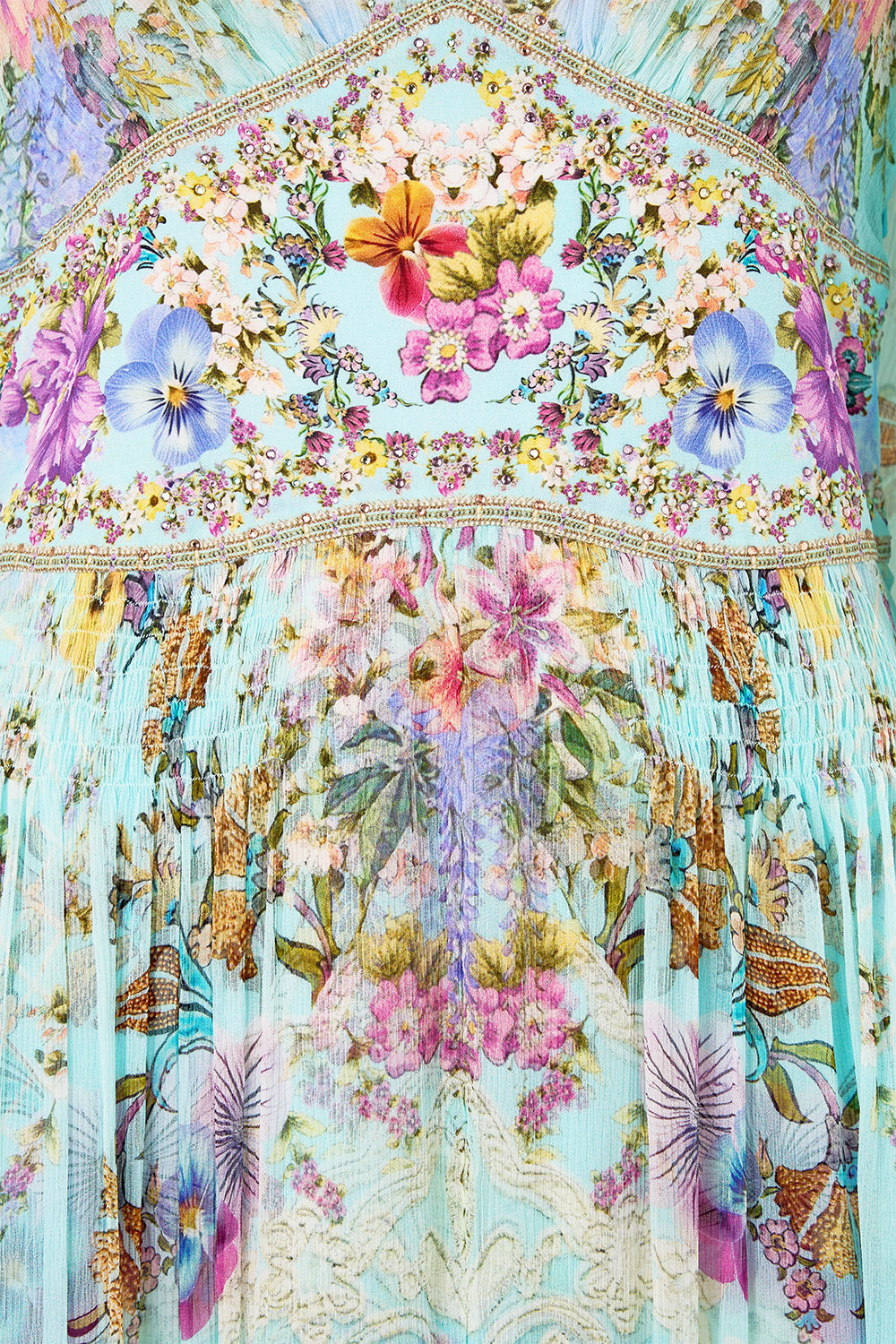 The CAMILLA RAFFIA CLUTCH WITH CHARMS NATURAL in our NATURAL print.