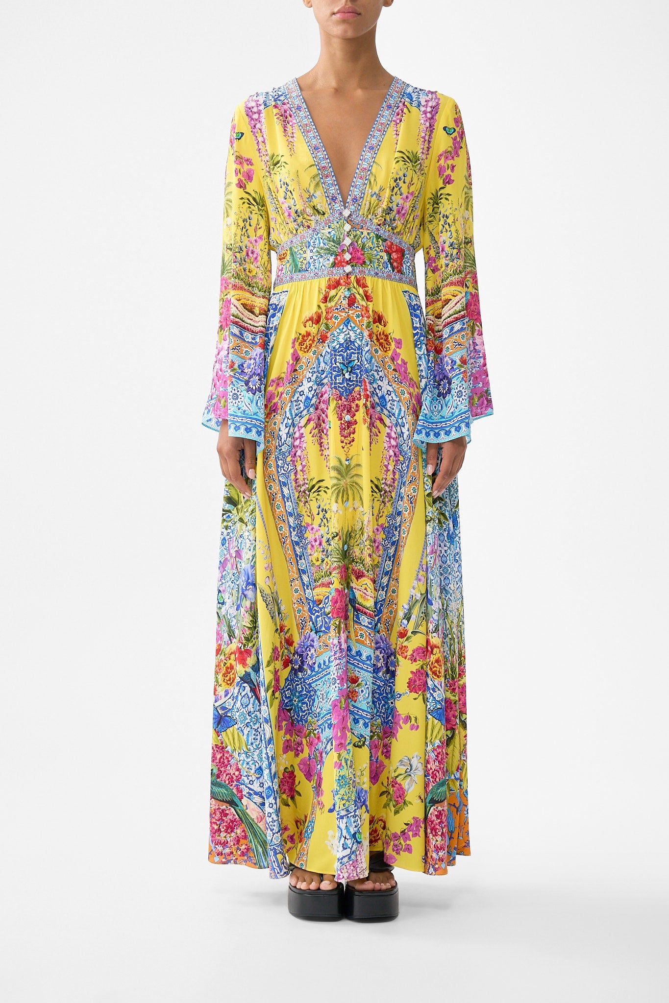 The CAMILLA CRINKLE STRETCH LONG SARONG WITH TRIM AND LEG SPLIT FELINE FOLKLORE in our  print.