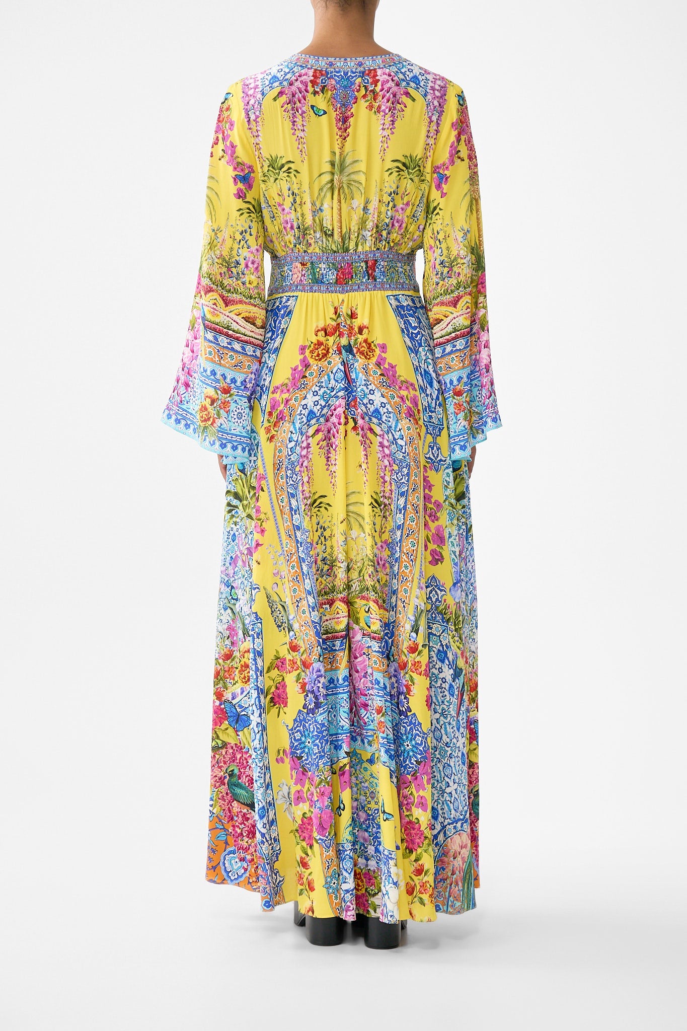 The CAMILLA CRINKLE STRETCH LONG SARONG WITH TRIM AND LEG SPLIT FELINE FOLKLORE in our  print.