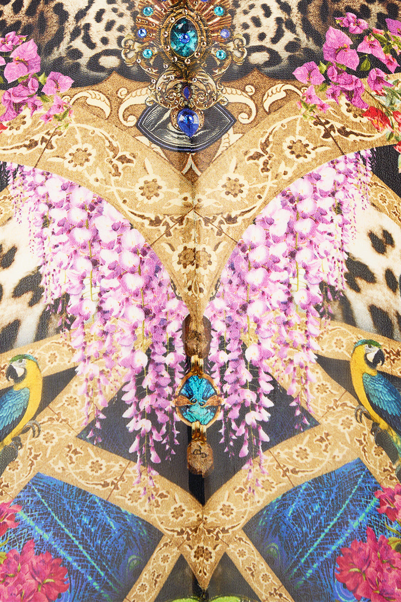 The CAMILLA TIE FRONT PUFF SLEEVE TOP COLLAGE KINGDOM in our  print.