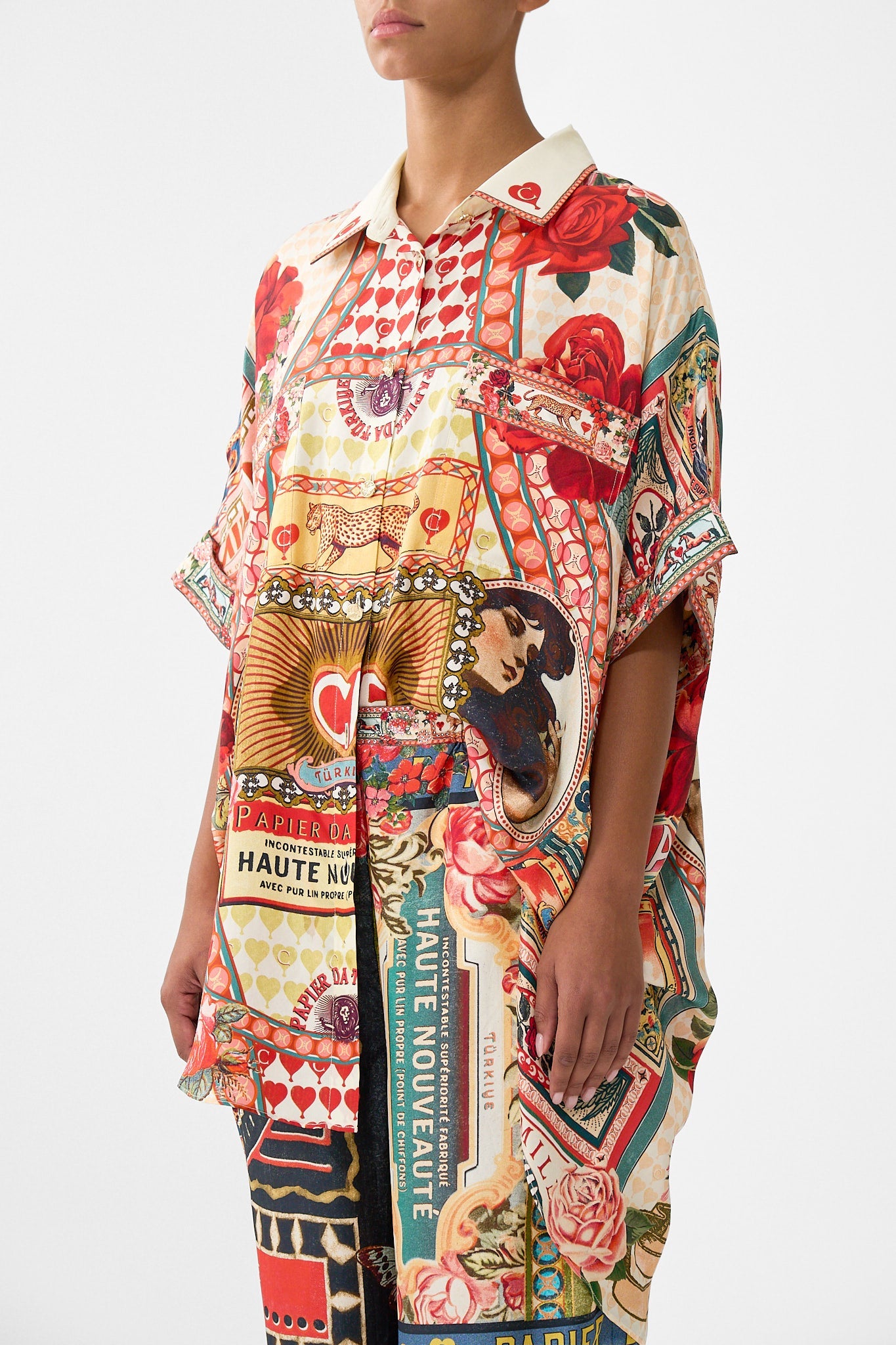 The CAMILLA KIDS STRAPPY FLOWY PLAYSUIT W SHIRRED BODICE DARLING BUDS in our DARLING BUDS print.