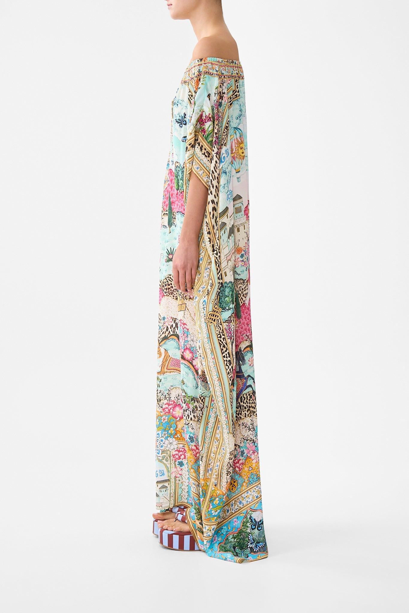 The CAMILLA TIE FRONT FRILL SLEEVE JUMPSUIT DARLING BUDS in our  print.