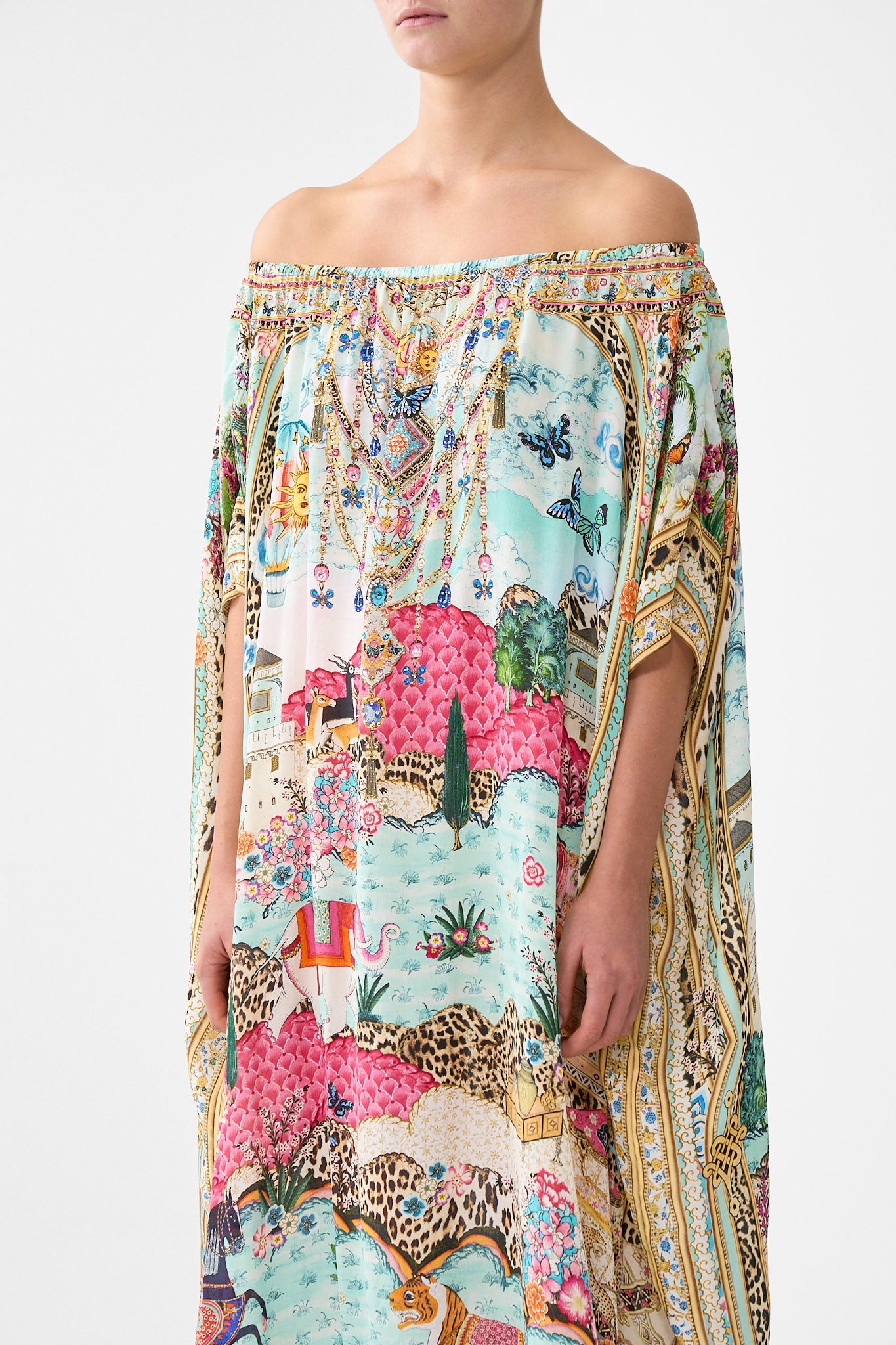 The CAMILLA TIE FRONT FRILL SLEEVE JUMPSUIT DARLING BUDS in our  print.