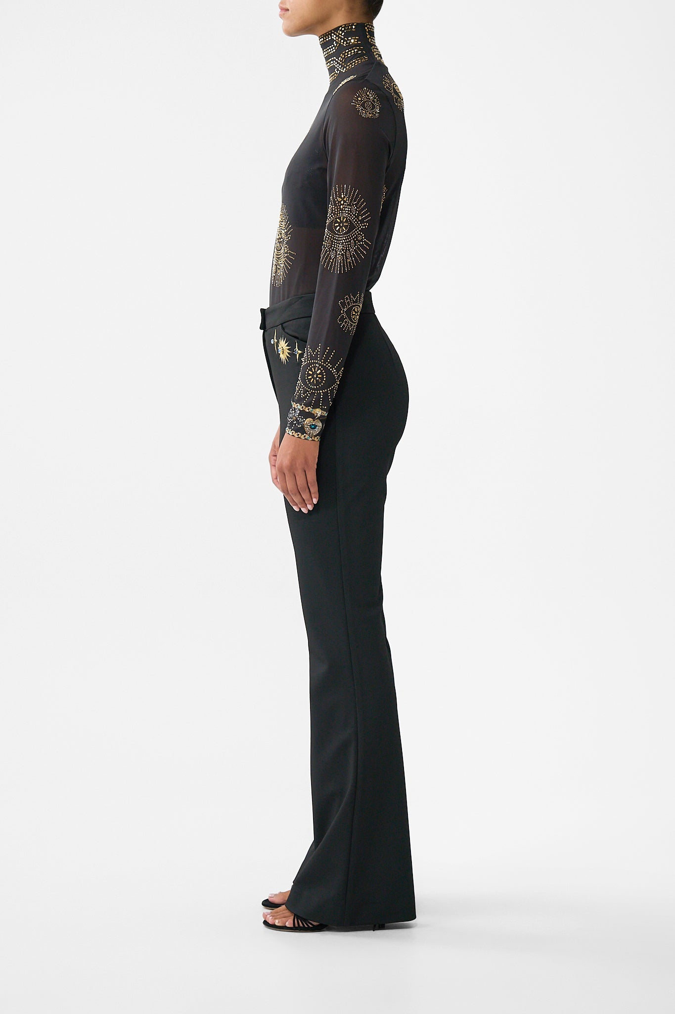 The CAMILLA MID LENGTH BOARDSHORT WITH ELASTIC WAIST THEY CALLED HER NEFERTARI in our THEY CALLED HER NEFERTARI print.