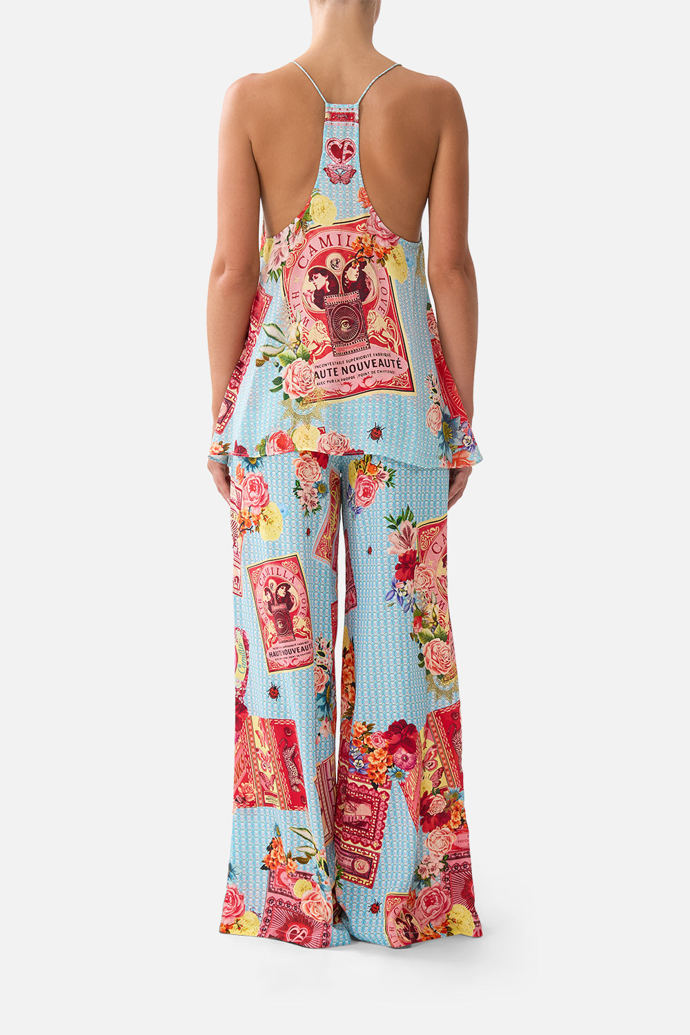 The CAMILLA LONG SPLIT FRONT TWIST DRESS FELINE FOLKLORE in our  print.