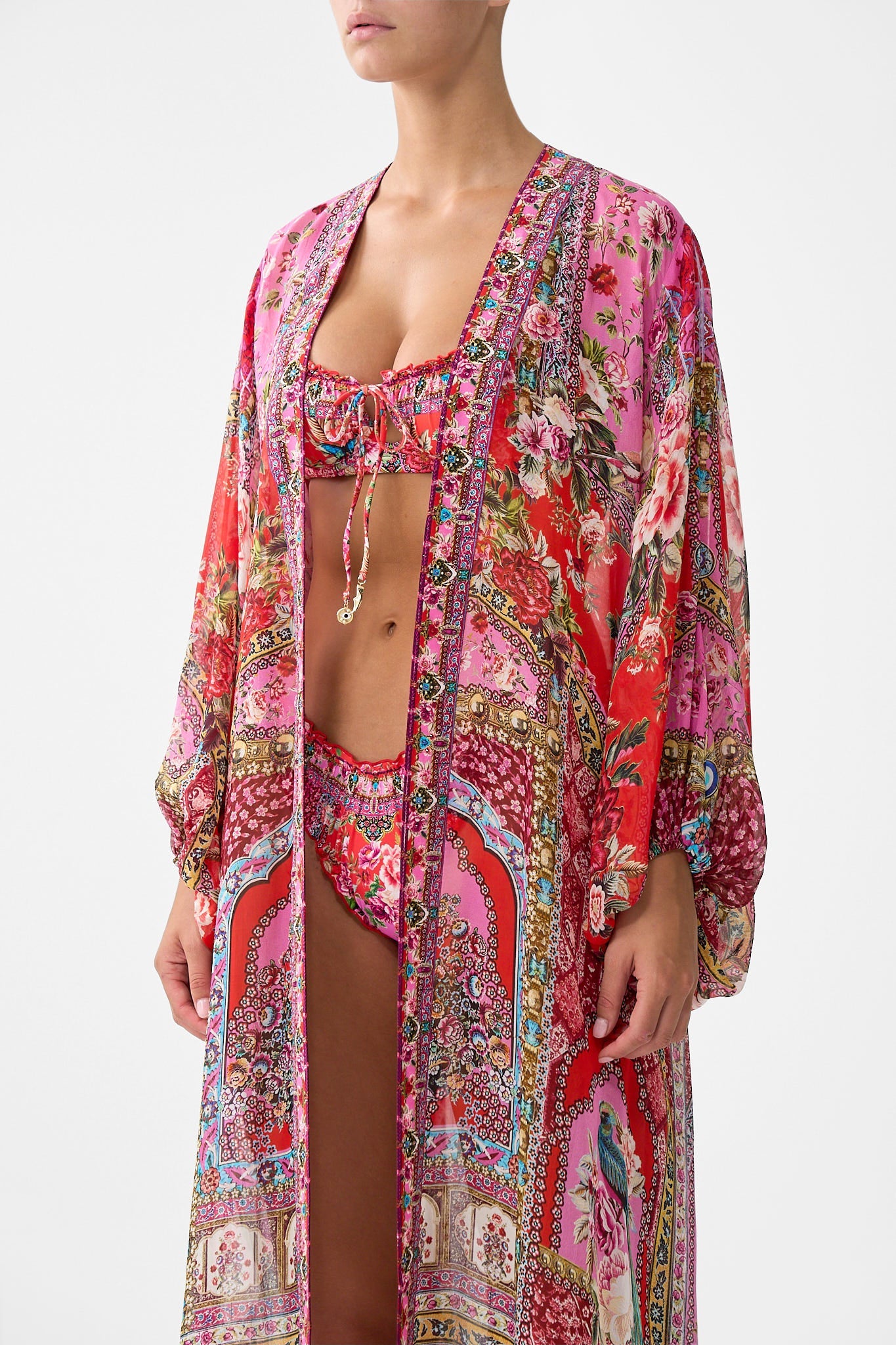 The CAMILLA MULTI STRAP HALTER TRI BIKINI TOP WITH TRIM CHAIN GANG in our  print.