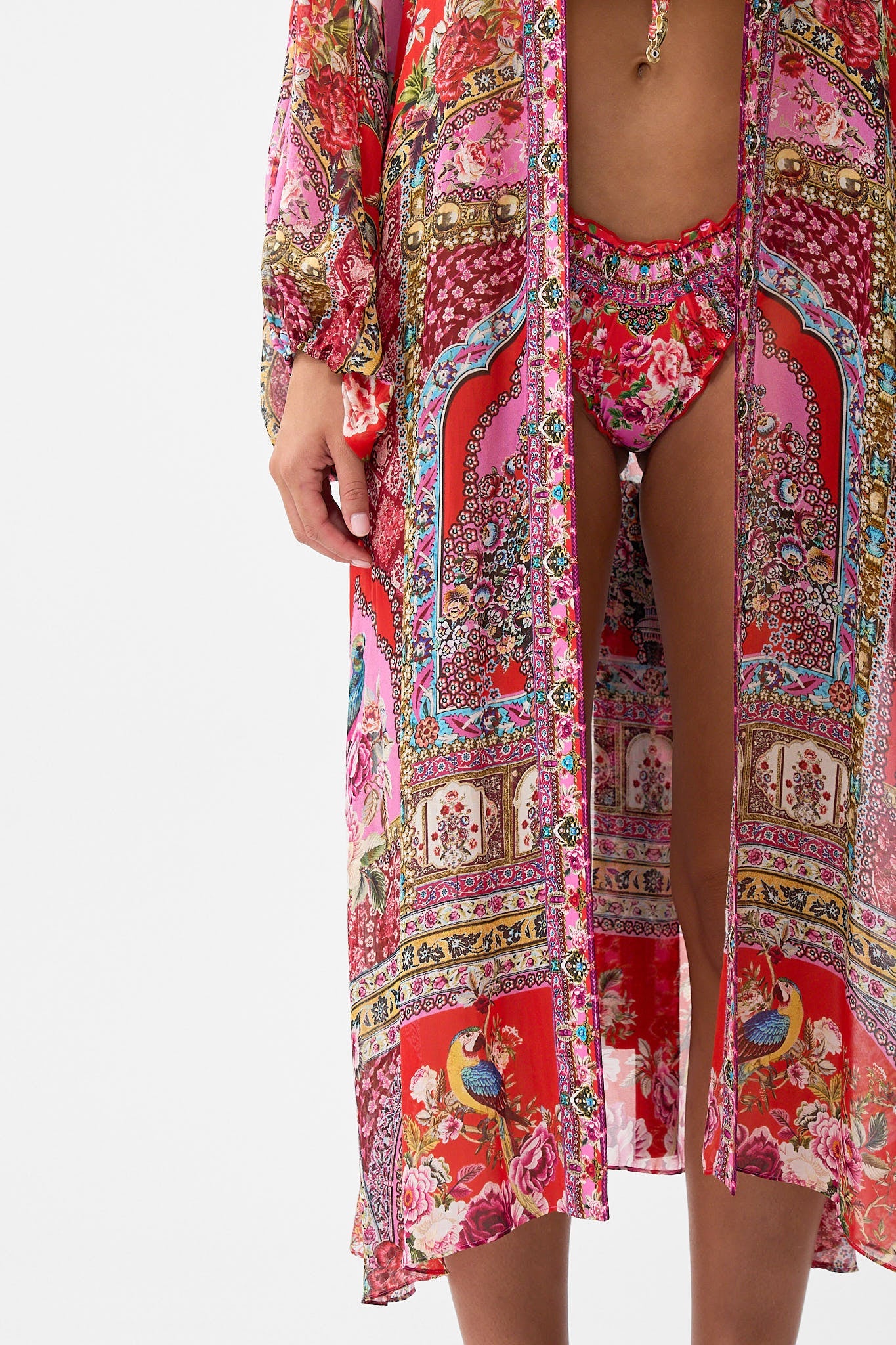The CAMILLA MULTI STRAP HALTER TRI BIKINI TOP WITH TRIM CHAIN GANG in our  print.