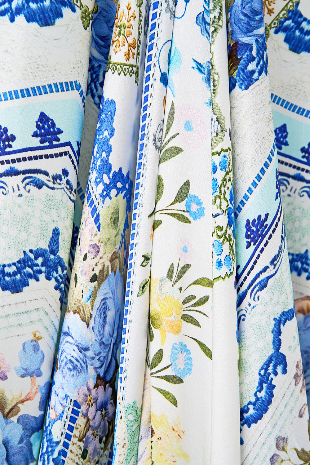 The CAMILLA SHORT FLARED DRESS WITH MACRAME DETAIL FABRIC OF TIME in our  print.