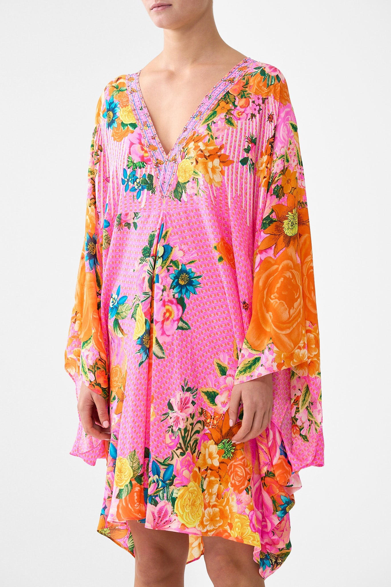 The CAMILLA FRILL OFF SHOULDER TOP LADY LIONHEART in our  print.