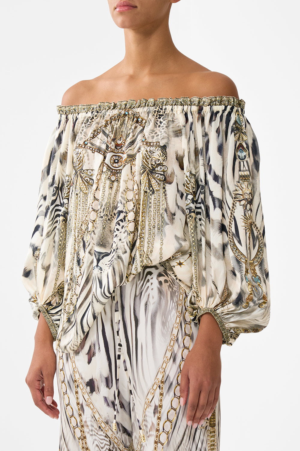 The CAMILLA COIN AND PHONE PURSE NAVÀS NOUVEAU in our  print.