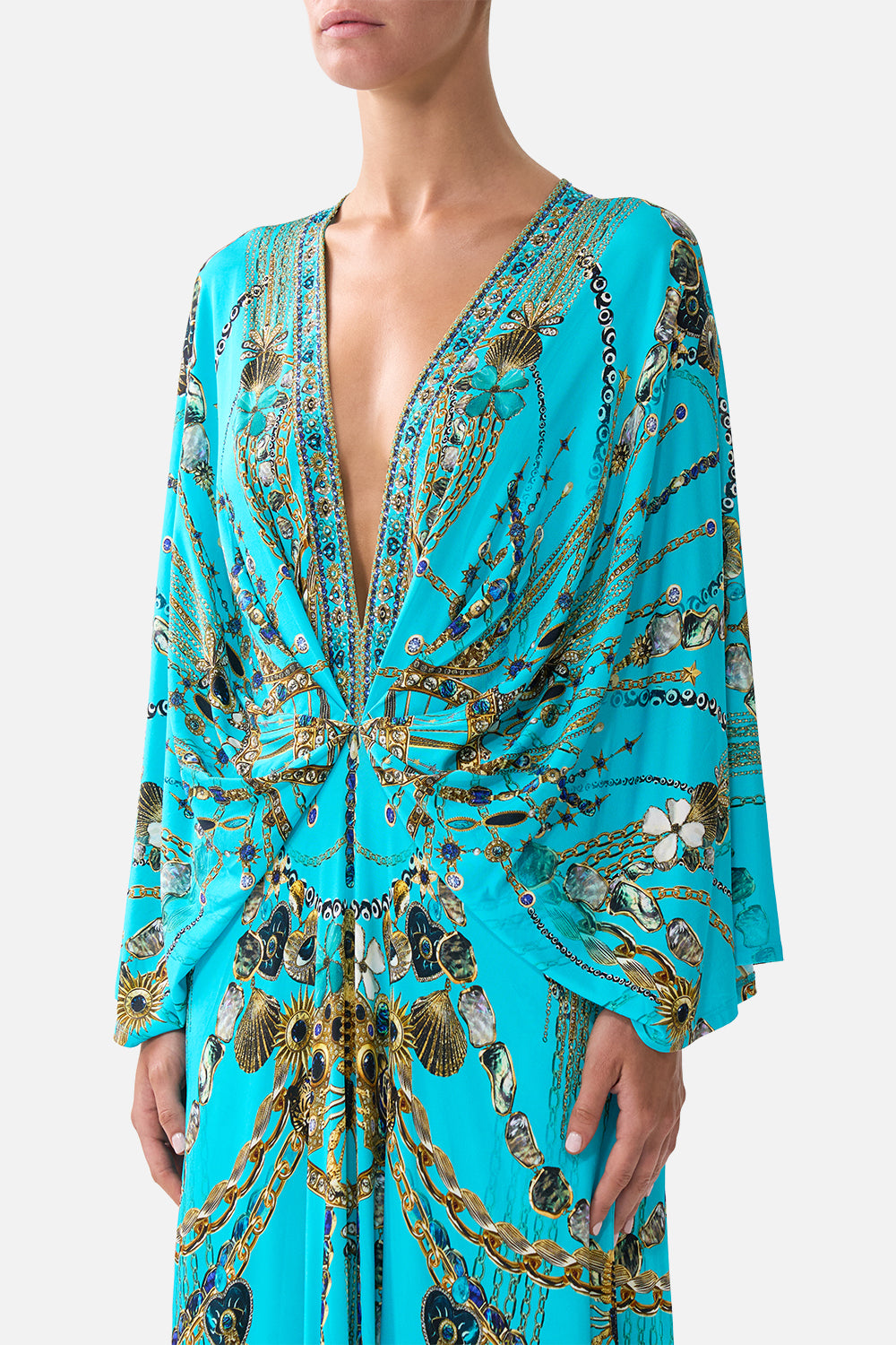 The CAMILLA HIGH TRI ONE PIECE WITH EYELET TIE FRONT TRIM ESPAÑA NIRVANA in our  print.