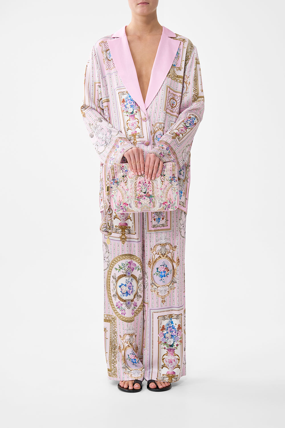 The CAMILLA BUTTON DRESS WITH SHAPED WAISTBAND SULTANS AND QUEENS in our  print.
