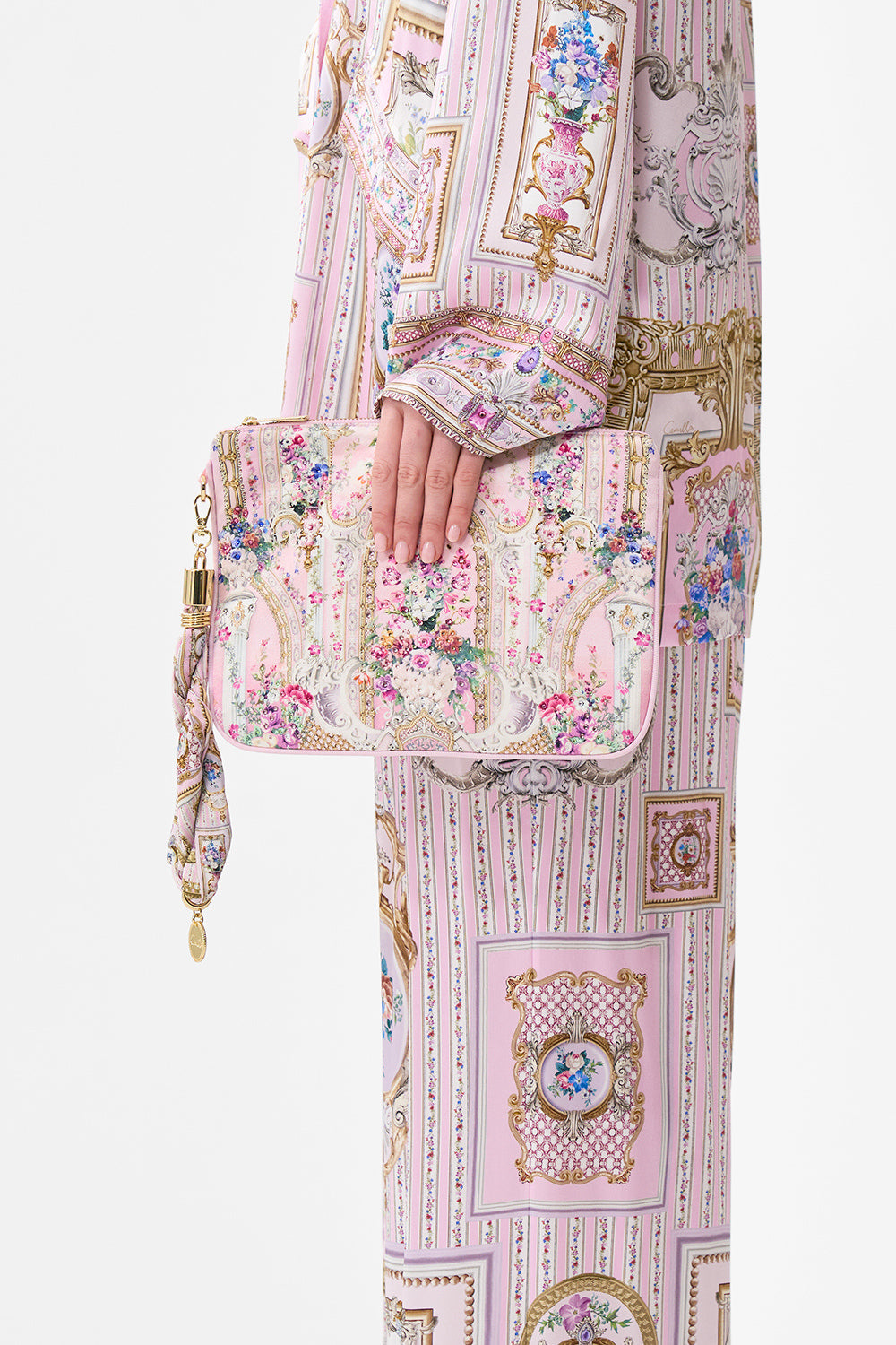 The CAMILLA BUTTON DRESS WITH SHAPED WAISTBAND SULTANS AND QUEENS in our  print.