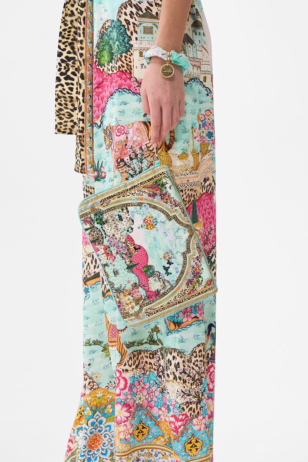 The CAMILLA V NECK FLARED JUMPSUIT JUNGLE FLIGHT in our  print.