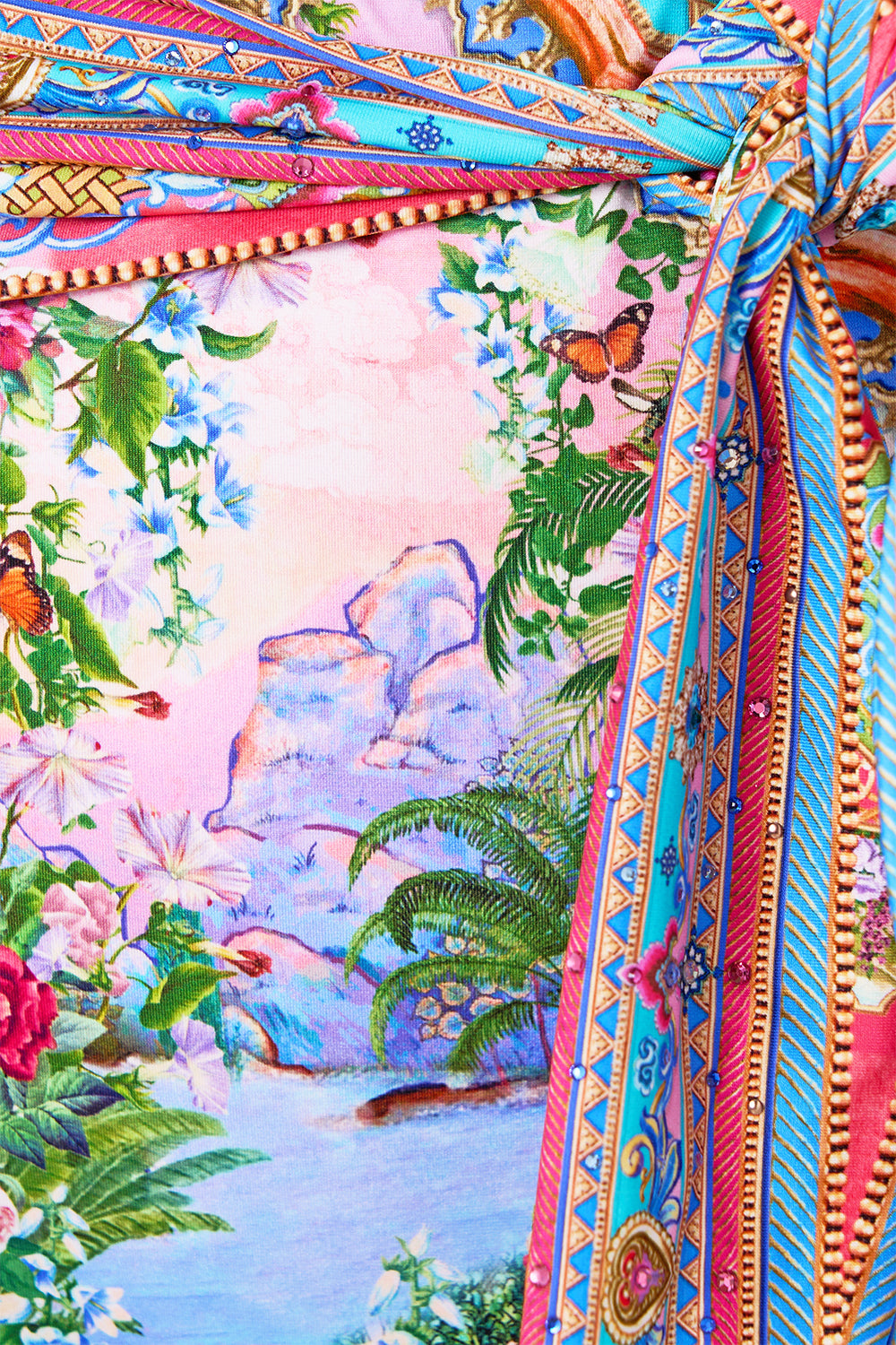 The CAMILLA BUTTON UP TOP WITH DRAPED BACK TOTEMS AND TREASURES in our  print.