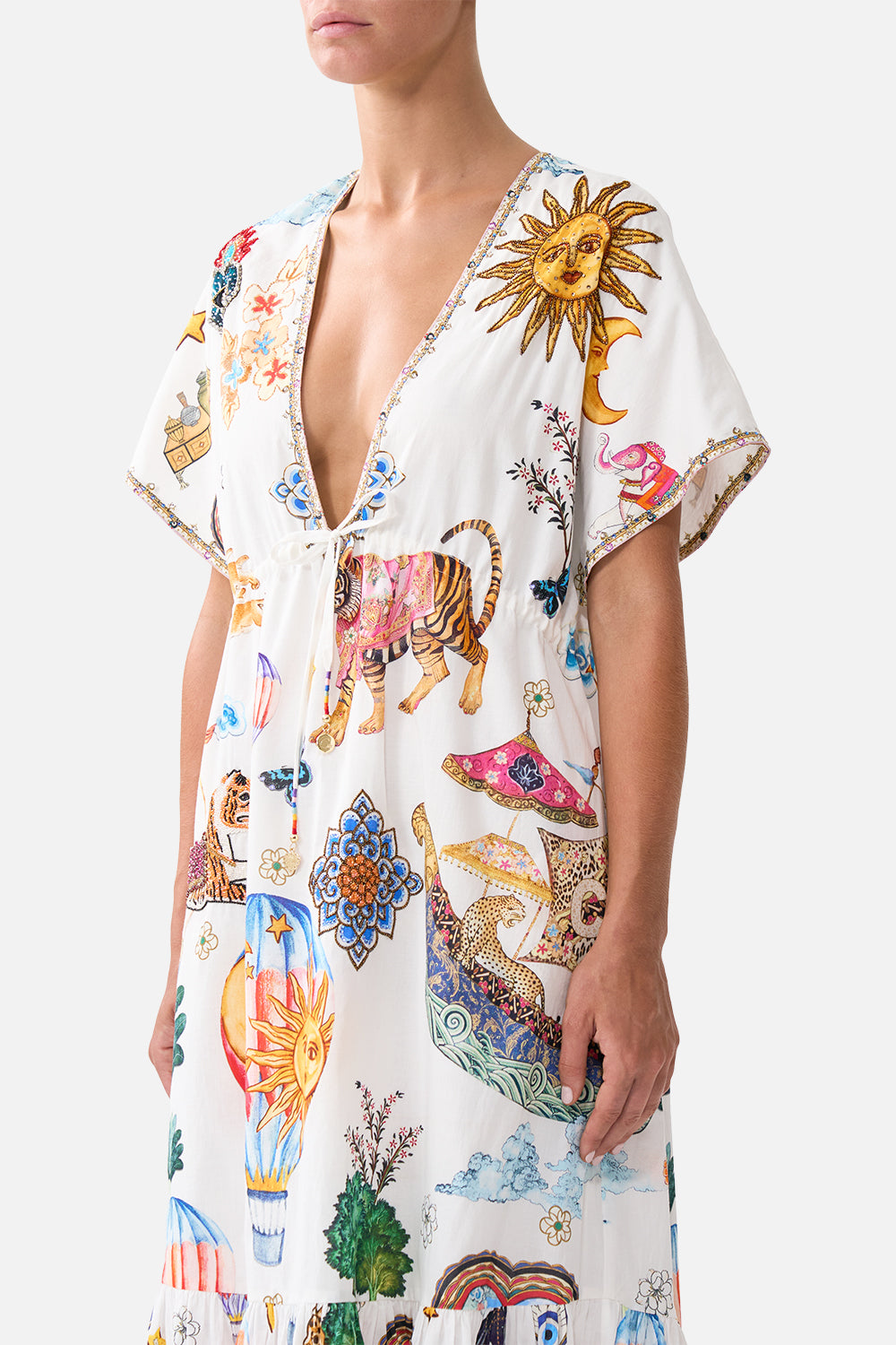 The CAMILLA DRAWSTRING POUCH WITH FRINGING OLÉ OLÉ in our  print.