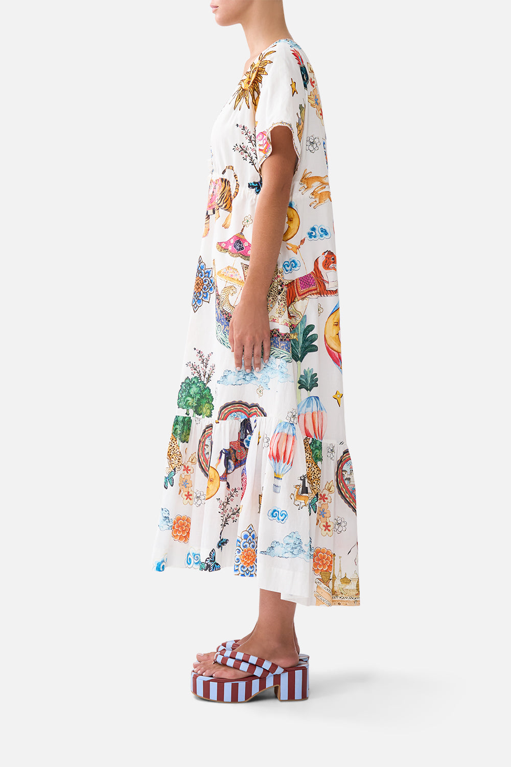 The CAMILLA DRAWSTRING POUCH WITH FRINGING OLÉ OLÉ in our  print.