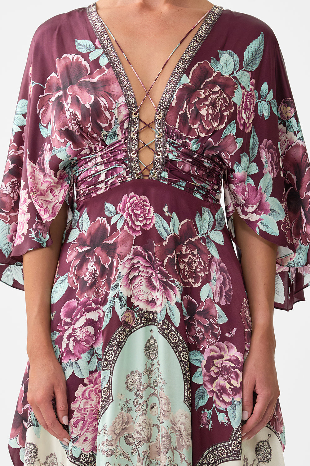 The CAMILLA WING COLLAR KAFTAN PAPERS AND CURIOUS CAPERS in our  print.