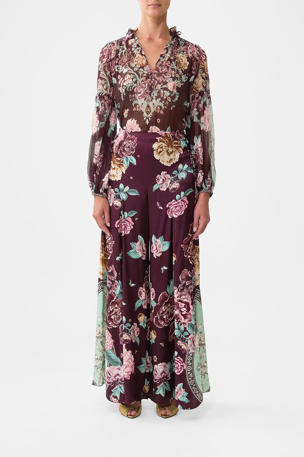 The CAMILLA LONG TIERED DRESS WITH BOW TIES PAPERS AND CURIOUS CAPERS in our  print.