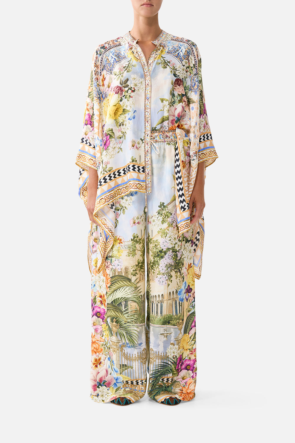 The CAMILLA V NECK KAFTAN WITH TIE WAIST CREAM LACE I LEFT MY HEART IN GRANADA in our  print.