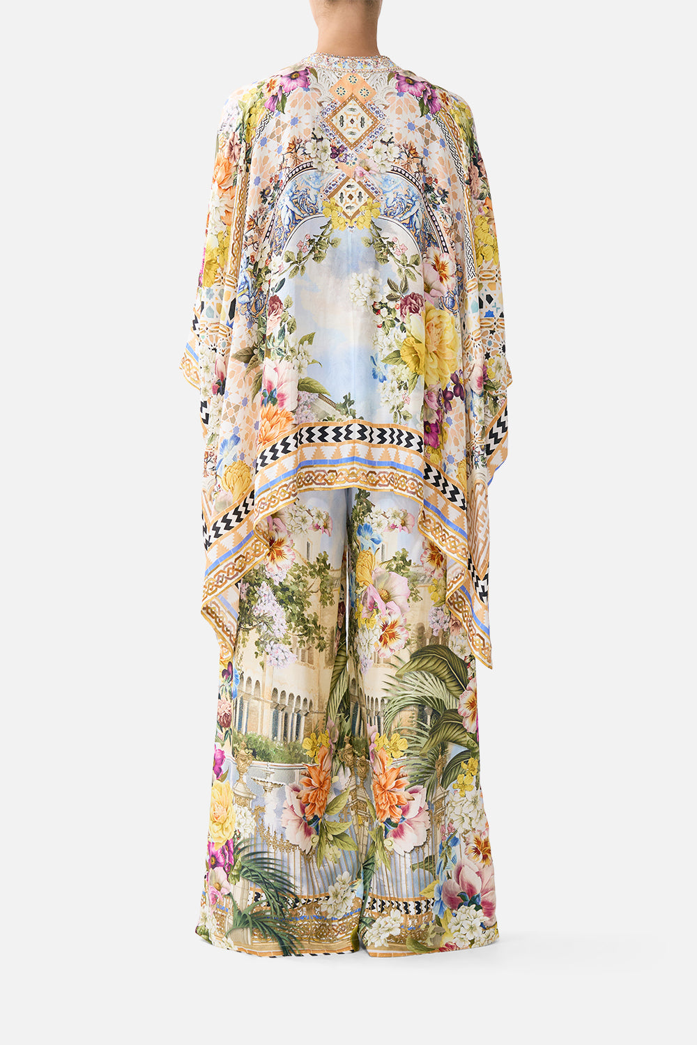 The CAMILLA V NECK KAFTAN WITH TIE WAIST CREAM LACE I LEFT MY HEART IN GRANADA in our  print.