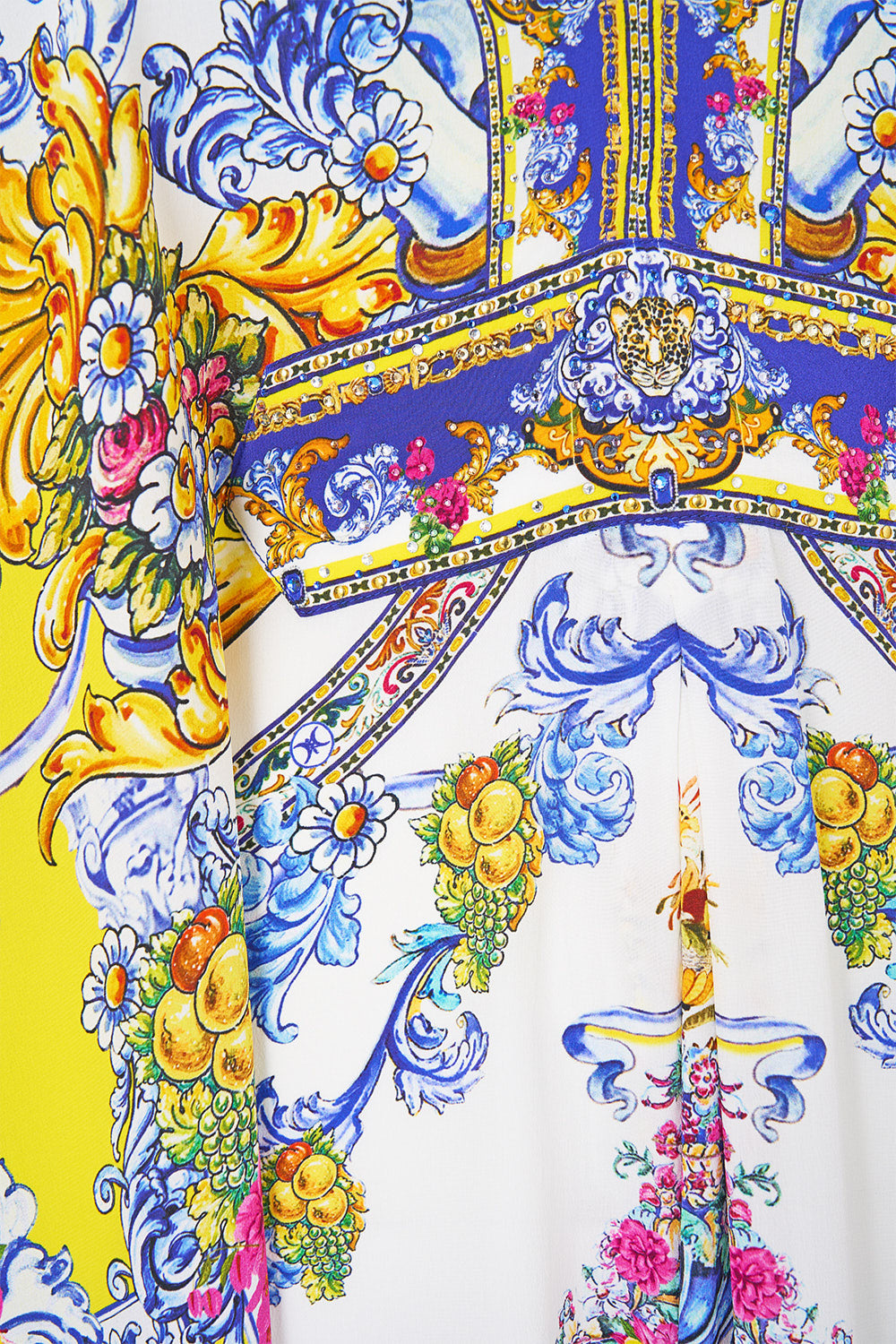 The CAMILLA GOLD CLOTHING MAGNETS FLAMENCO FOLKLORE in our  print.